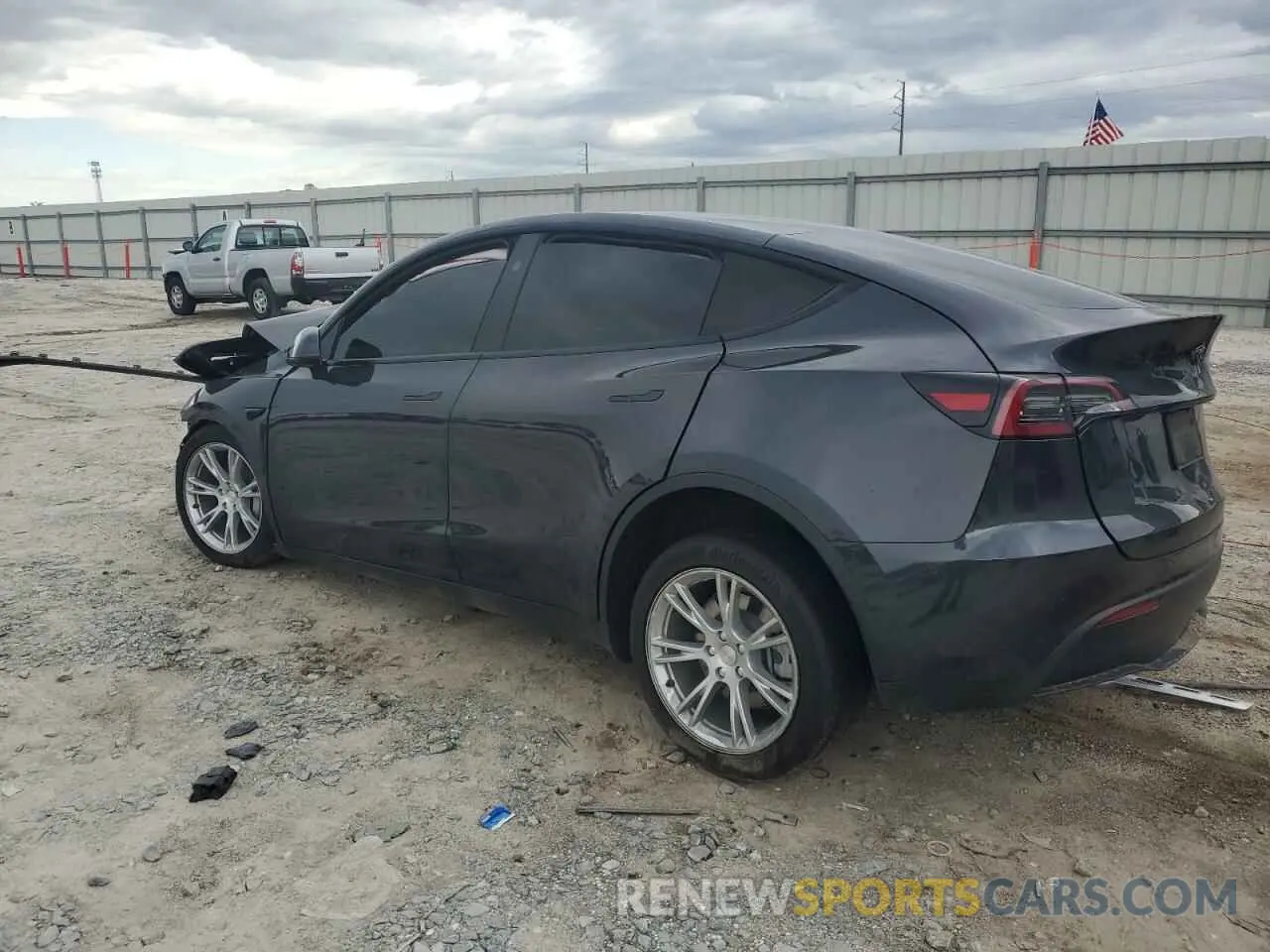 2 fotografías del automóvil dañado 7SAYGDEE3RF993215 TESLA MODEL Y 2024