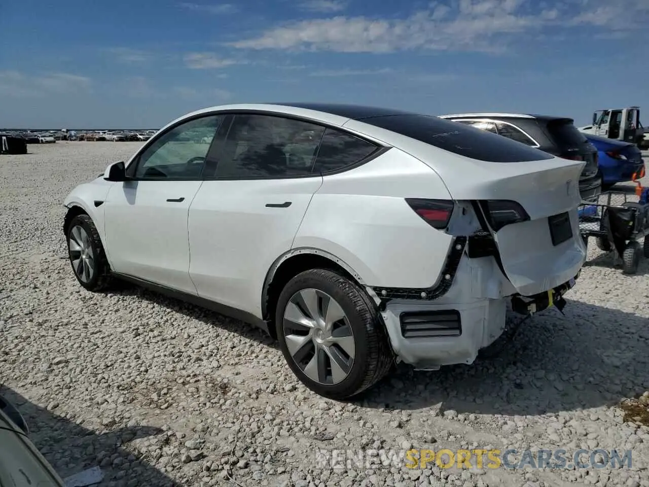 2 fotografías del automóvil dañado 7SAYGDEE5RA290471 TESLA MODEL Y 2024