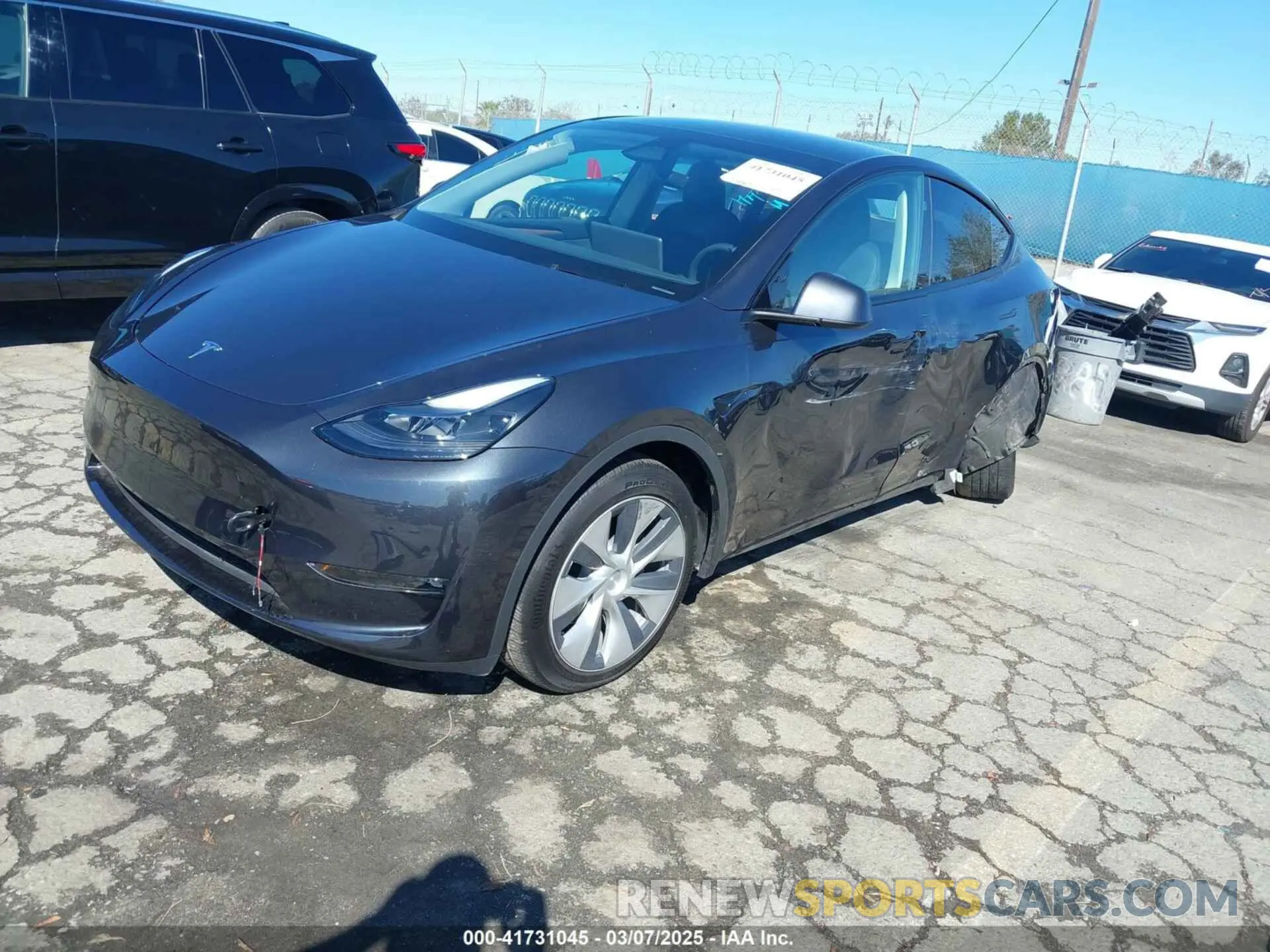 2 fotografías del automóvil dañado 7SAYGDEE5RF003424 TESLA MODEL Y 2024