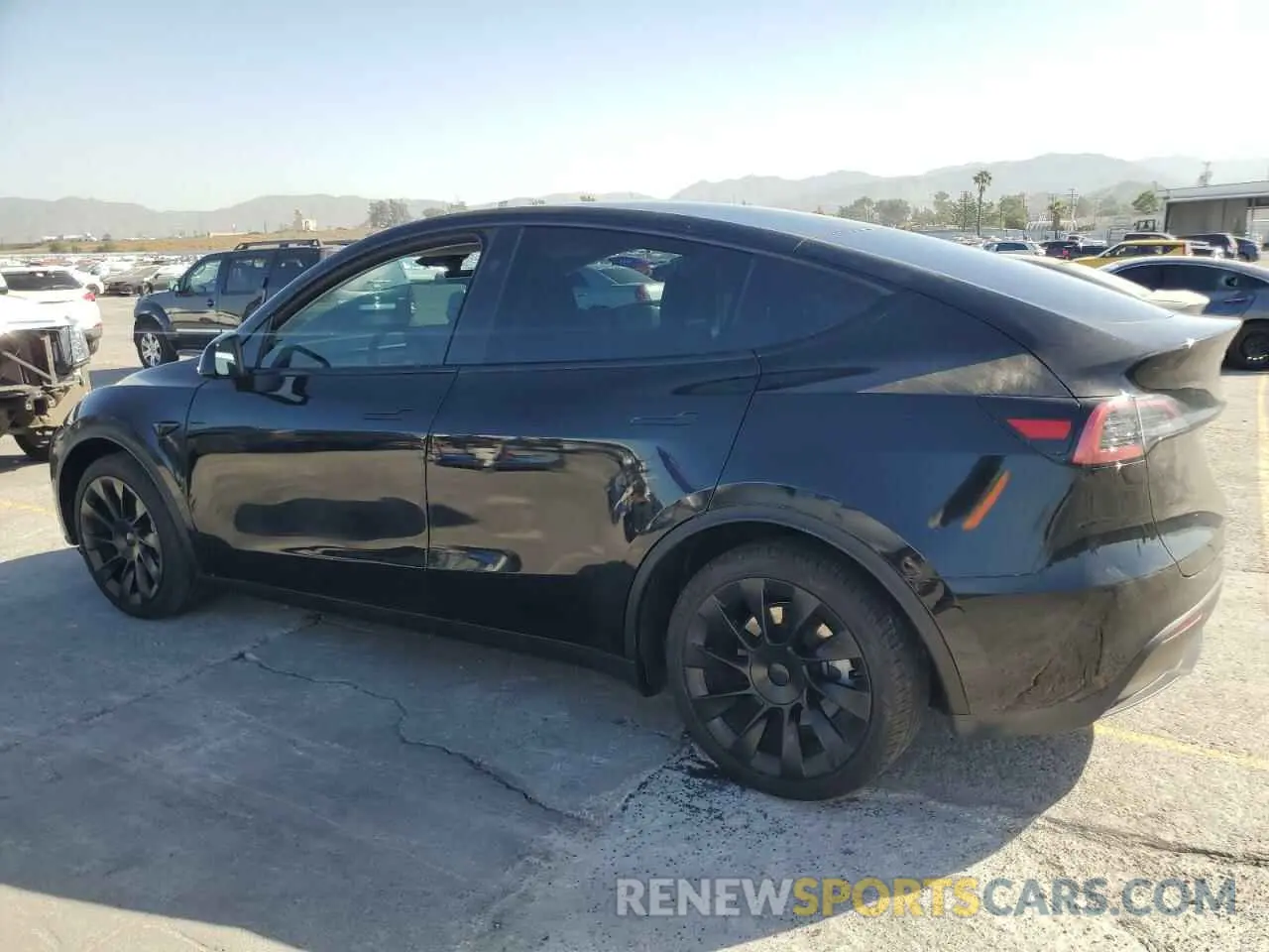 2 fotografías del automóvil dañado 7SAYGDEE8RA231933 TESLA MODEL Y 2024