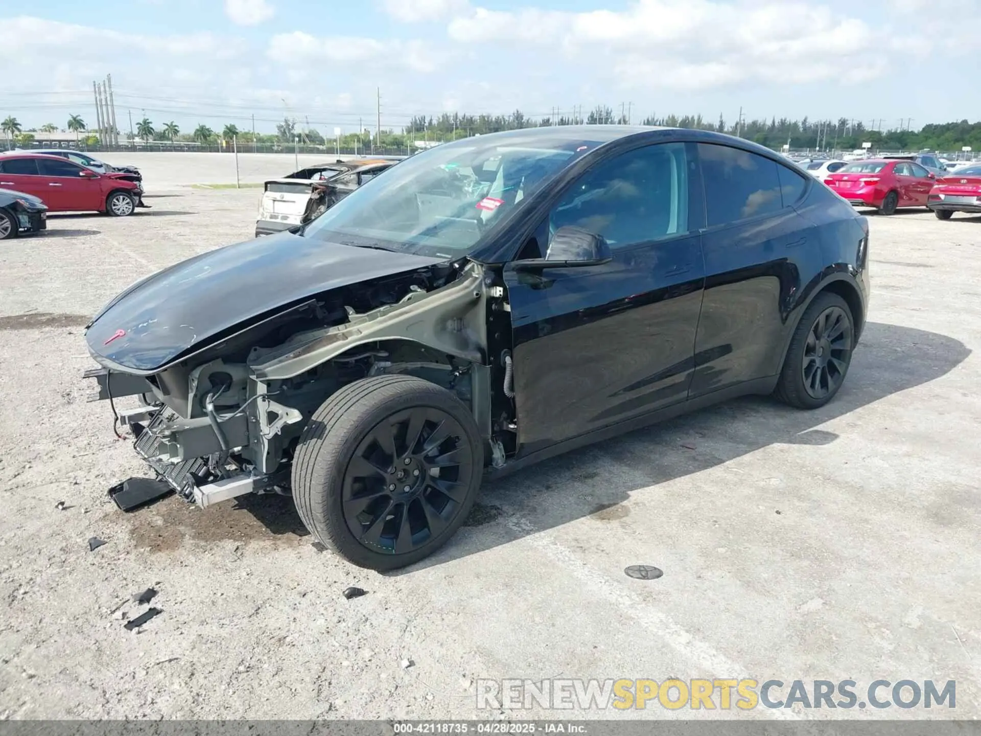 2 fotografías del automóvil dañado 7SAYGDEE9RA293261 TESLA MODEL Y 2024