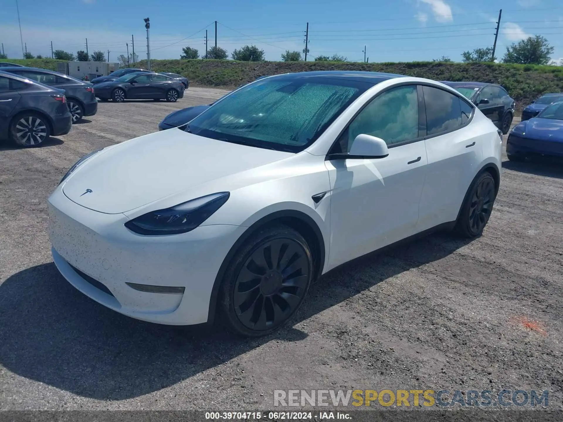 2 fotografías del automóvil dañado 7SAYGDEF2RA268971 TESLA MODEL Y 2024
