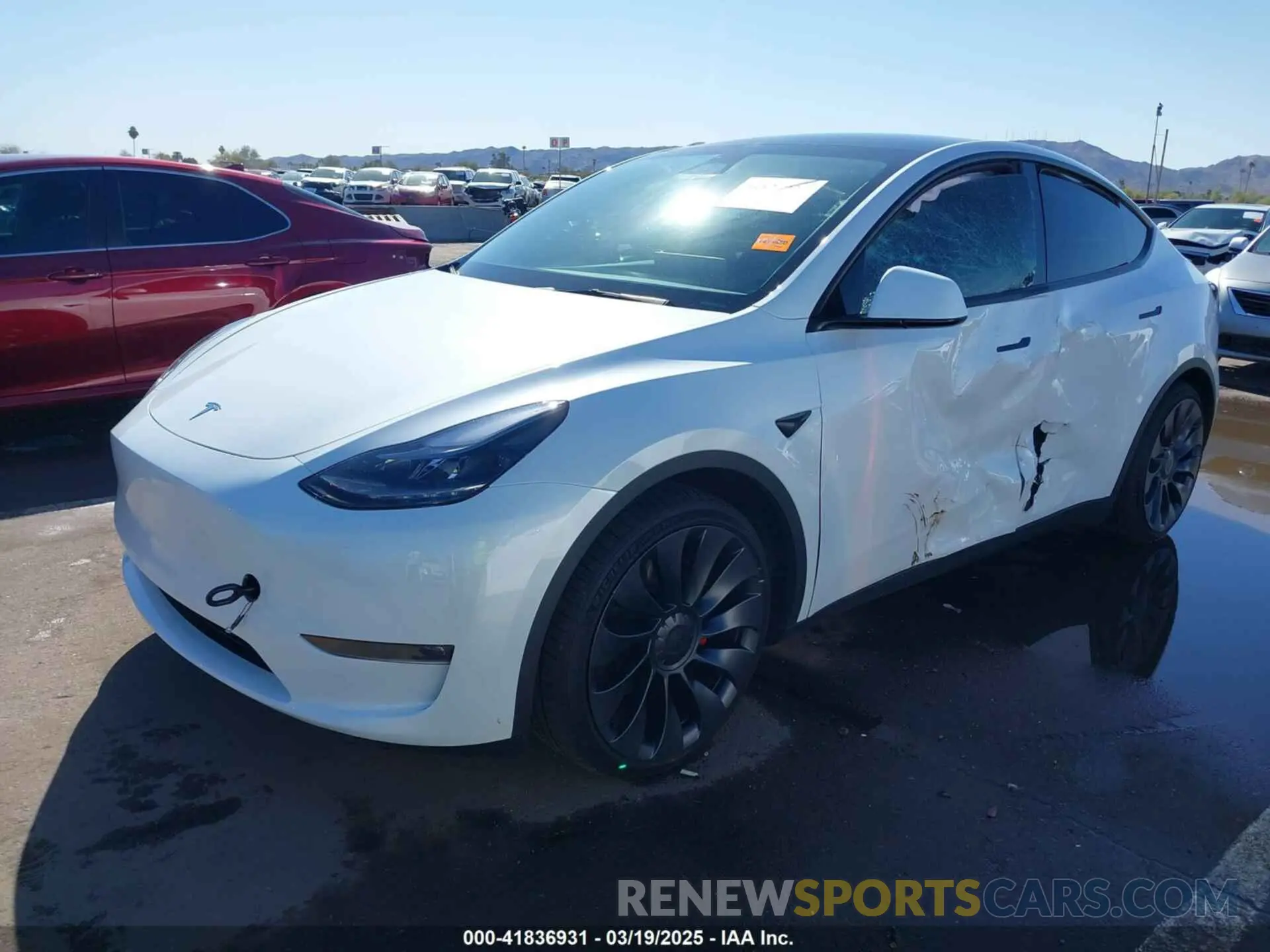 2 fotografías del automóvil dañado 7SAYGDEF4RF053711 TESLA MODEL Y 2024