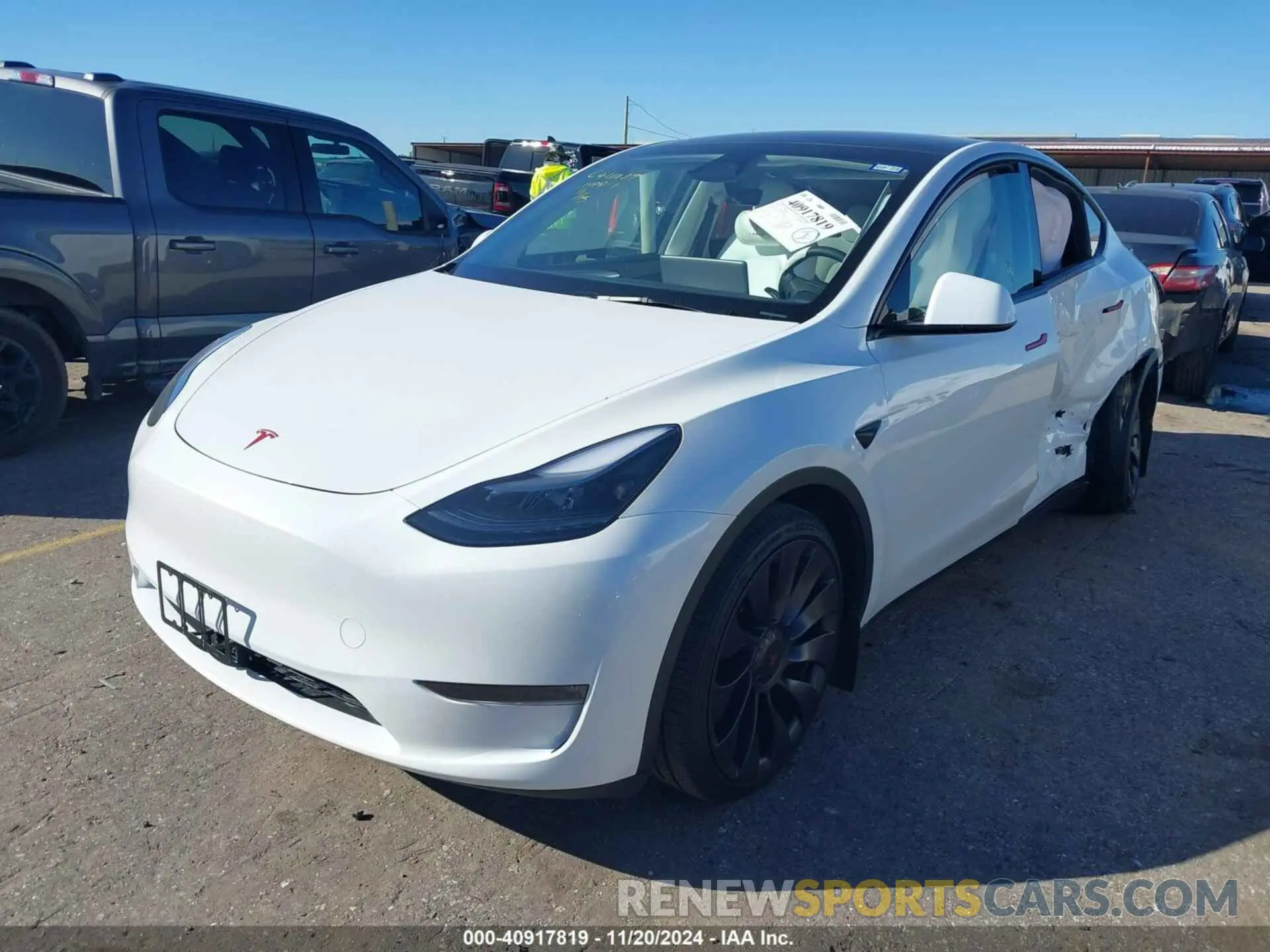 2 fotografías del automóvil dañado 7SAYGDEF7RA335483 TESLA MODEL Y 2024