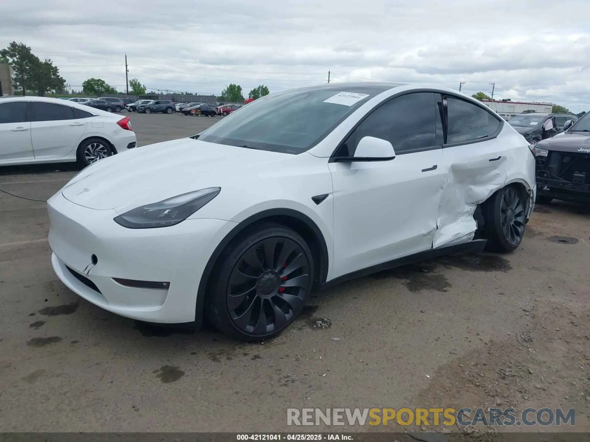 2 fotografías del automóvil dañado 7SAYGDEFXRF170662 TESLA MODEL Y 2024