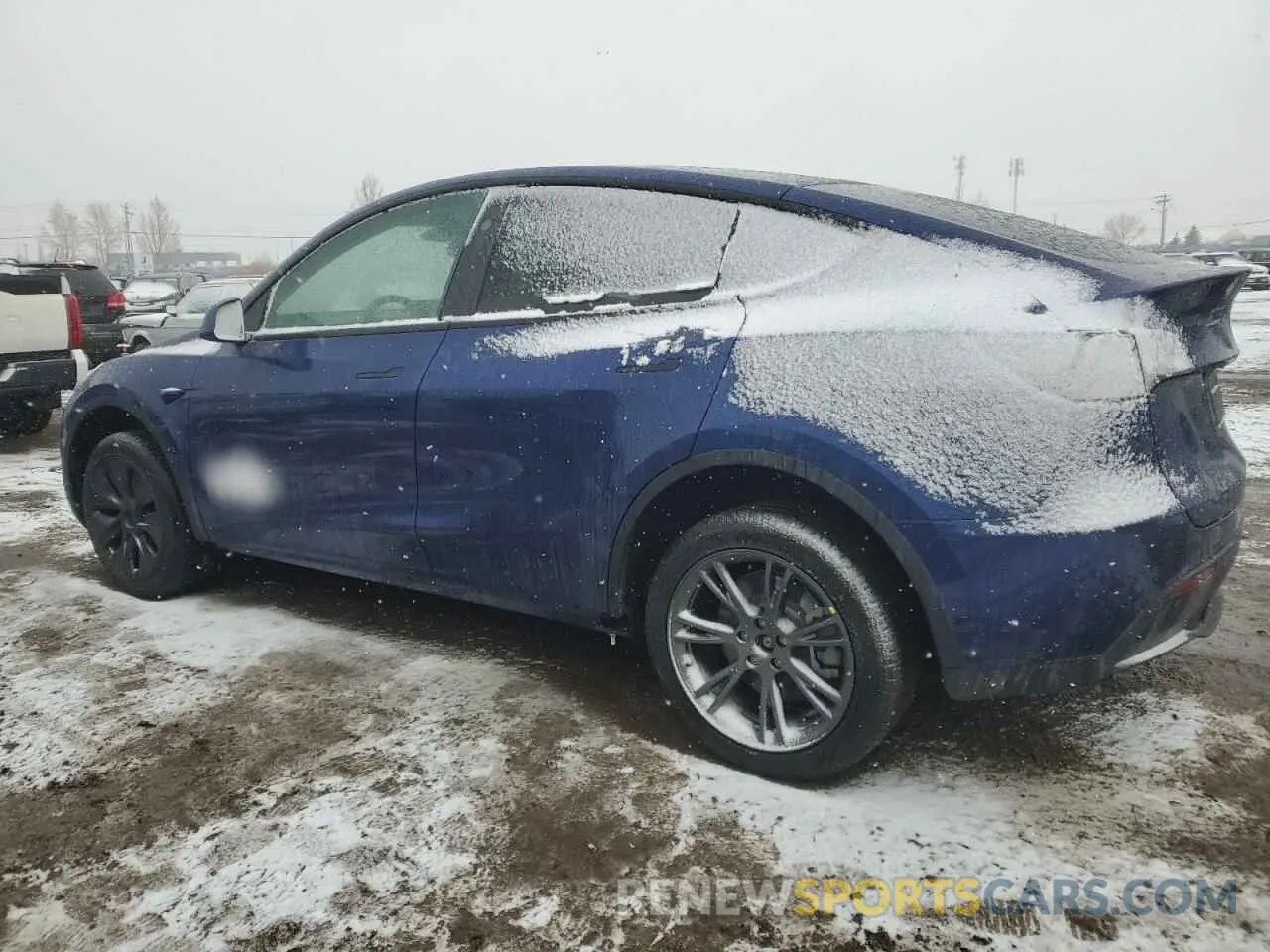 2 fotografías del automóvil dañado LRWYGDEE3RC661444 TESLA MODEL Y 2024