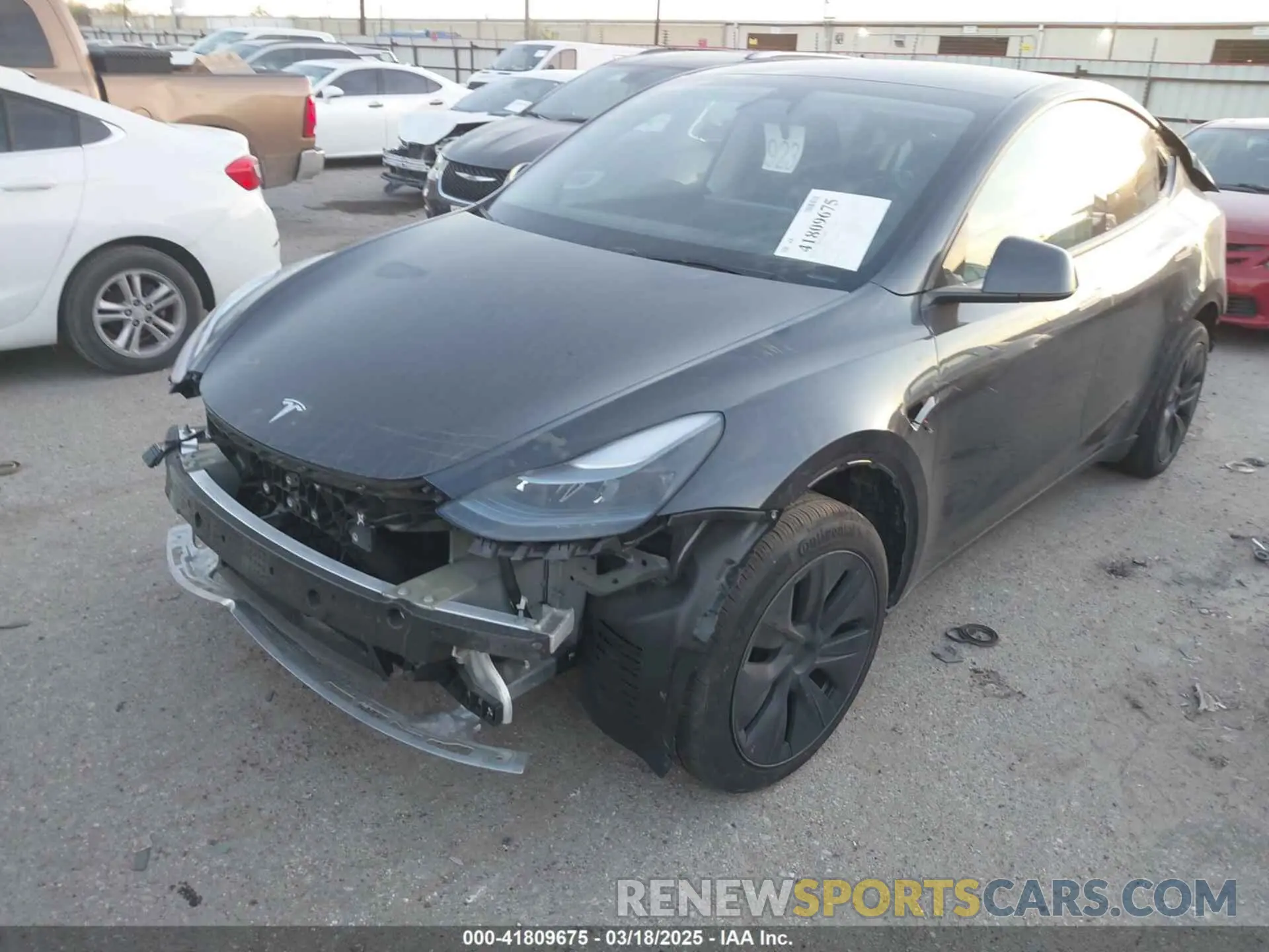 2 fotografías del automóvil dañado 7SAYGAEE3SF257640 TESLA MODEL Y 2025
