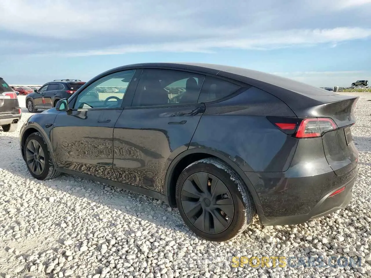 2 fotografías del automóvil dañado 7SAYGAEE5SF287996 TESLA MODEL Y 2025