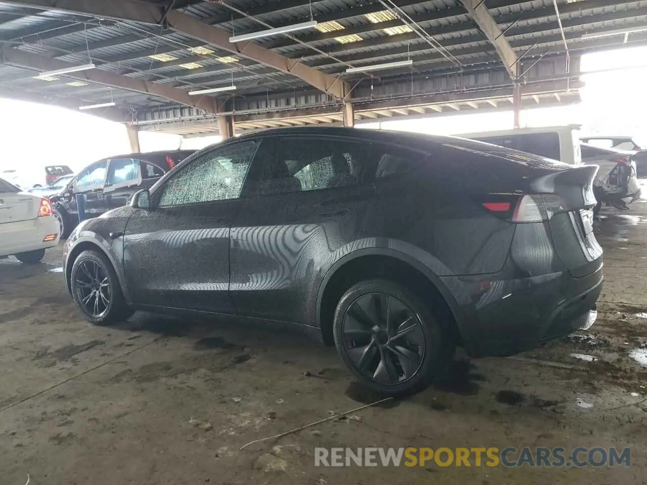 2 fotografías del automóvil dañado 7SAYGDED0SF262044 TESLA MODEL Y 2025