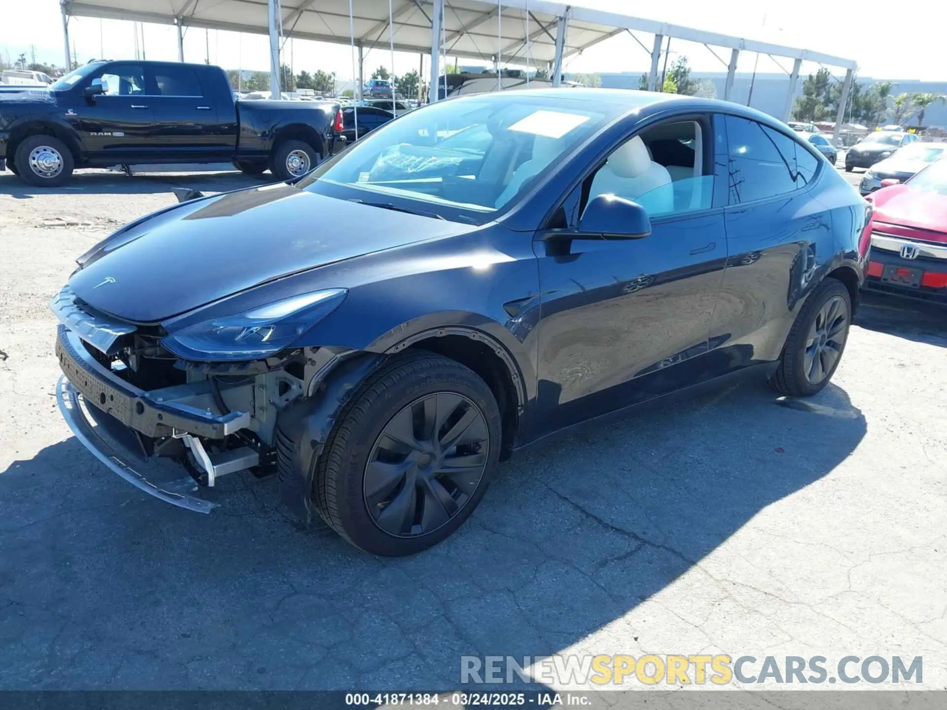 2 fotografías del automóvil dañado 7SAYGDED0SF314885 TESLA MODEL Y 2025