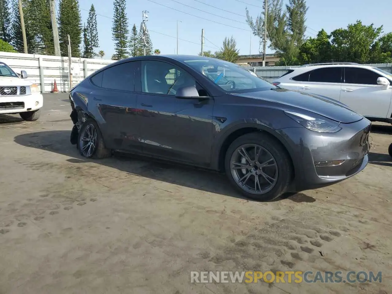 4 fotografías del automóvil dañado 7SAYGDED2SA374423 TESLA MODEL Y 2025
