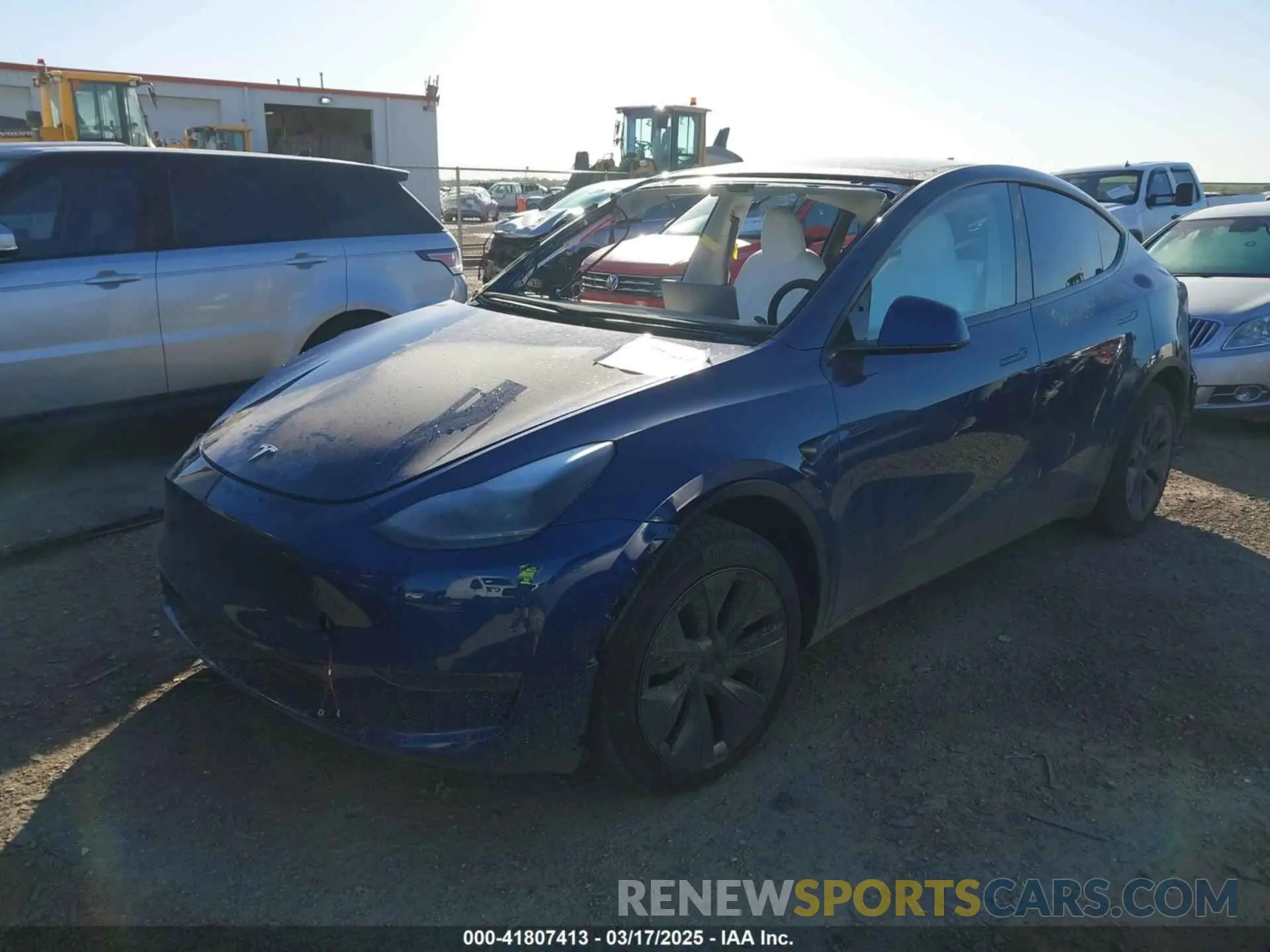 2 fotografías del automóvil dañado 7SAYGDED5SA374626 TESLA MODEL Y 2025