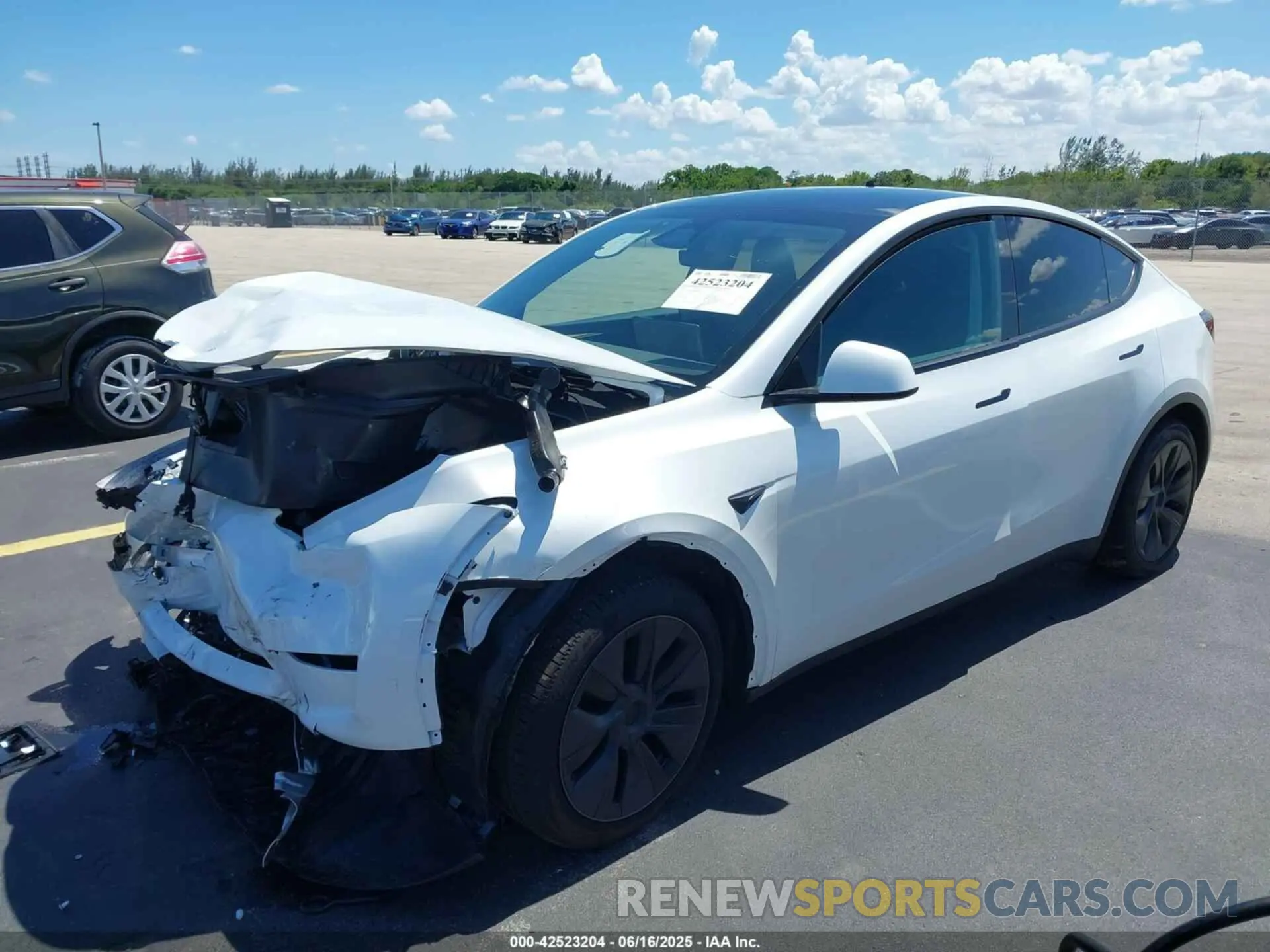 2 fotografías del automóvil dañado 7SAYGDED6SA369726 TESLA MODEL Y 2025