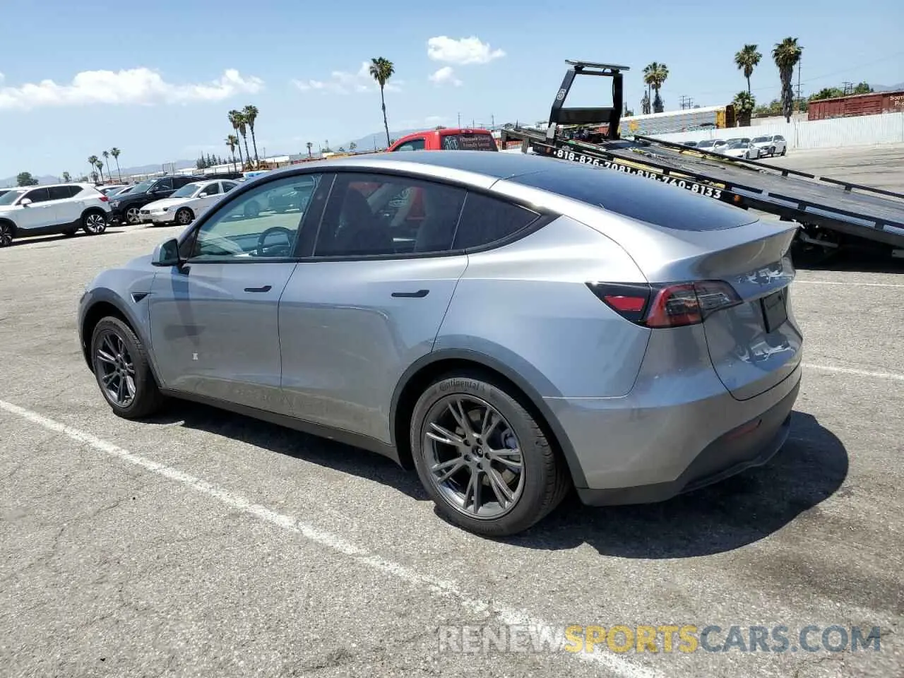 2 fotografías del automóvil dañado 7SAYGDED6SF253901 TESLA MODEL Y 2025