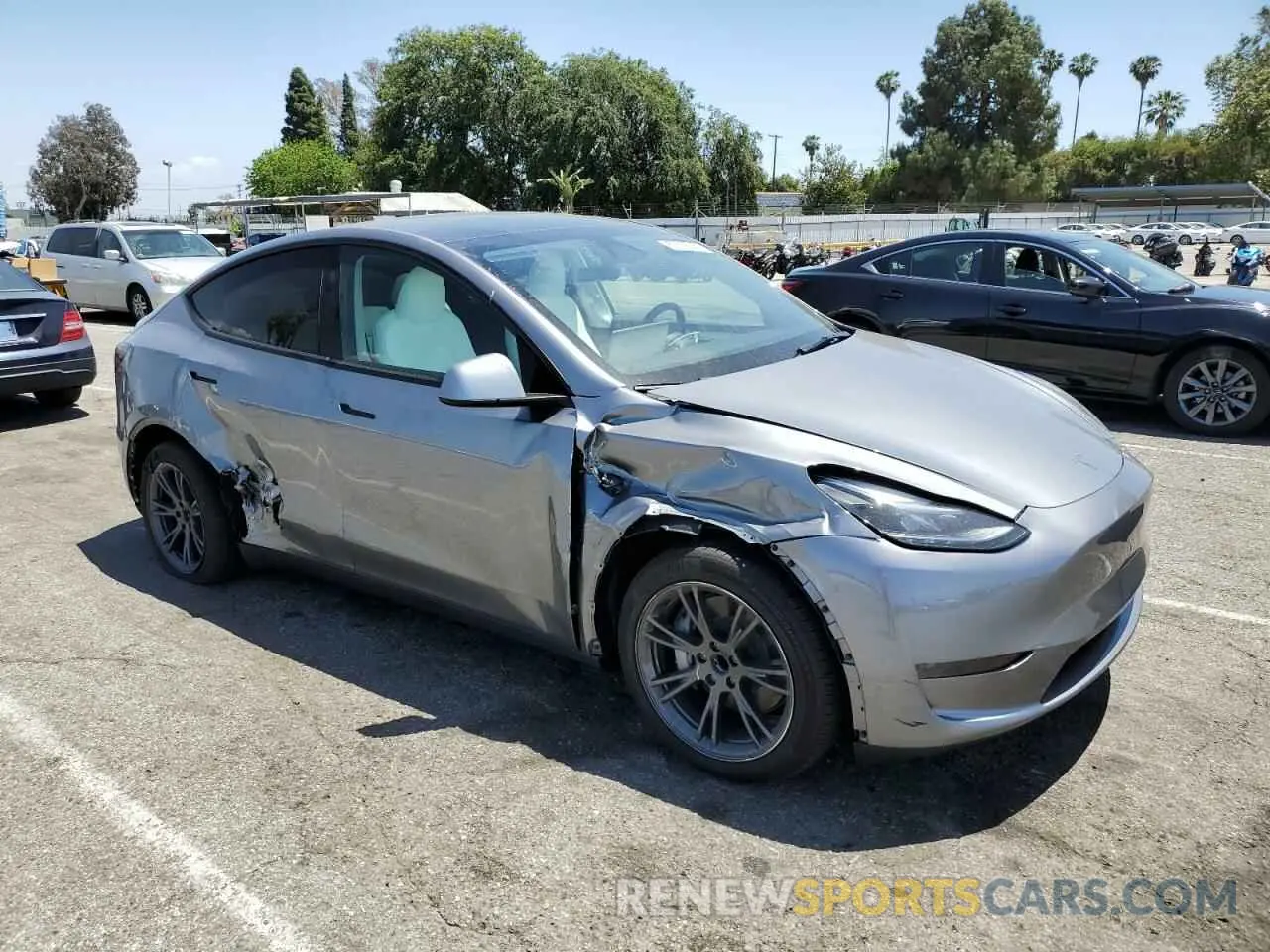4 fotografías del automóvil dañado 7SAYGDED6SF253901 TESLA MODEL Y 2025