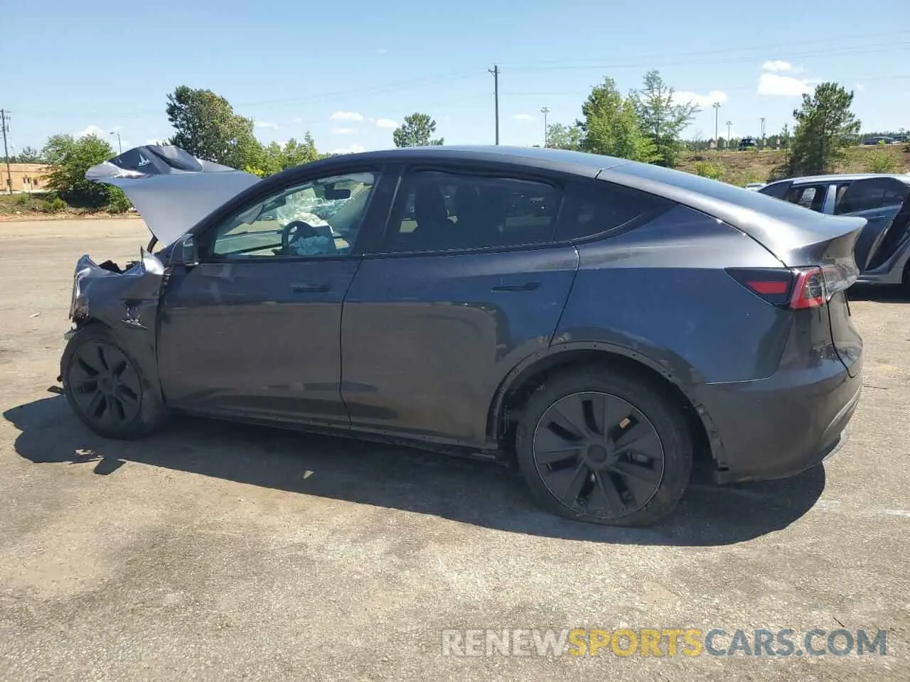 2 fotografías del automóvil dañado 7SAYGDED7SA348741 TESLA MODEL Y 2025