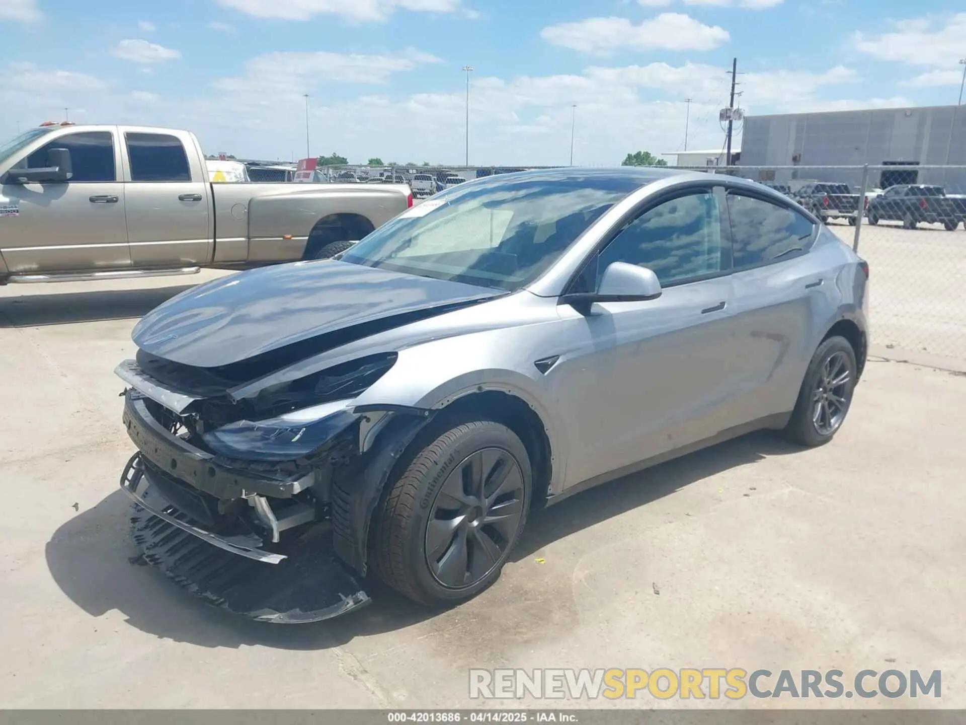 2 fotografías del automóvil dañado 7SAYGDED7SA357679 TESLA MODEL Y 2025