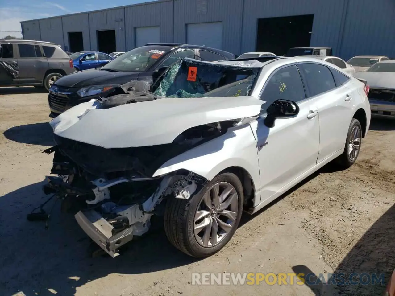 2 fotografías del automóvil dañado 4T1B21FB1KU002798 TOYOTA AVALON 2019