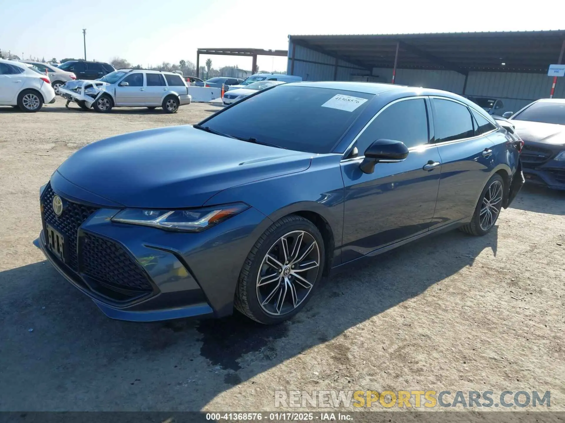 2 fotografías del automóvil dañado 4T1HZ1FB1NU073039 TOYOTA AVALON 2022