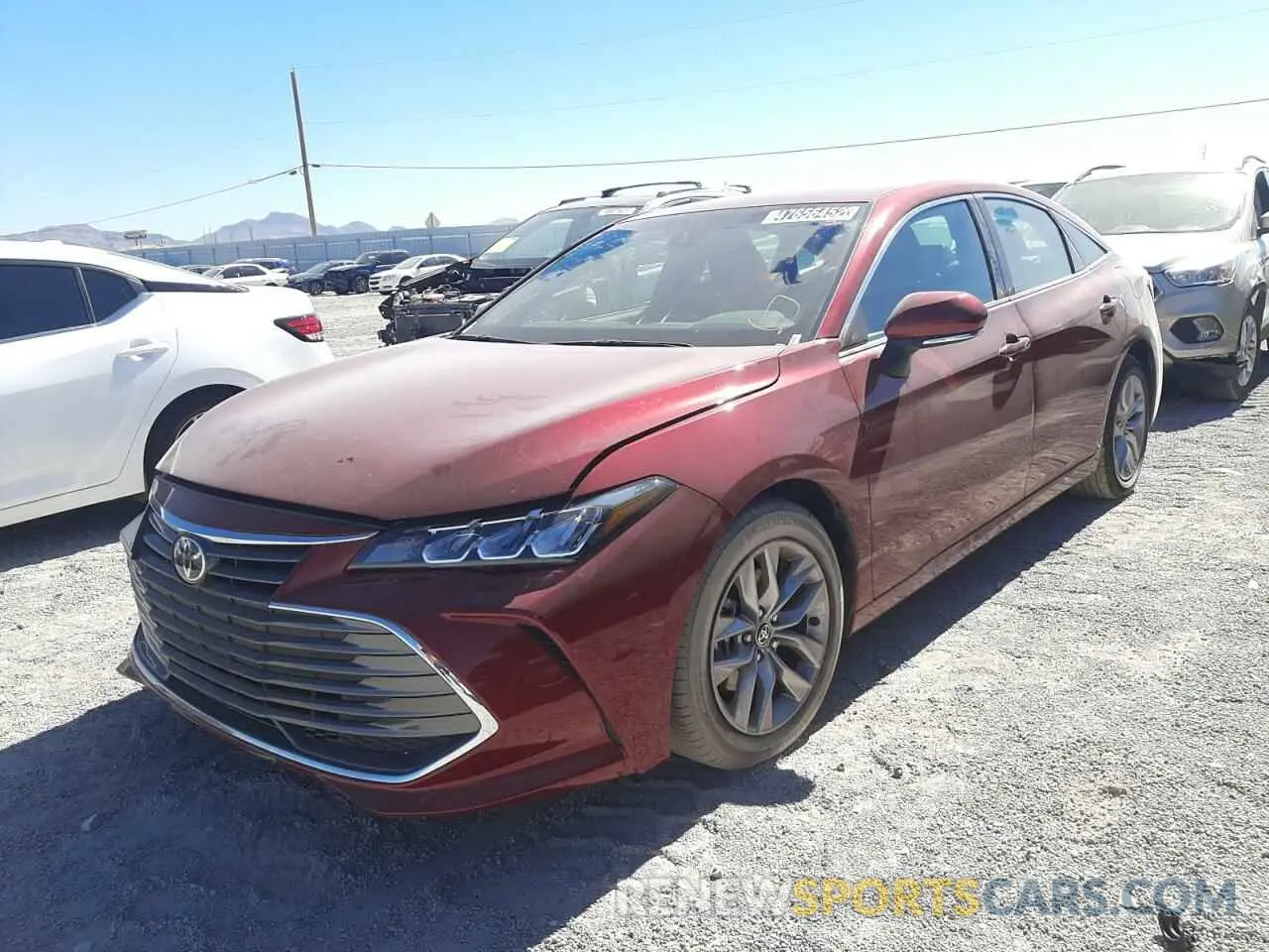 2 fotografías del automóvil dañado 4T1JZ1FBXNU076782 TOYOTA AVALON 2022