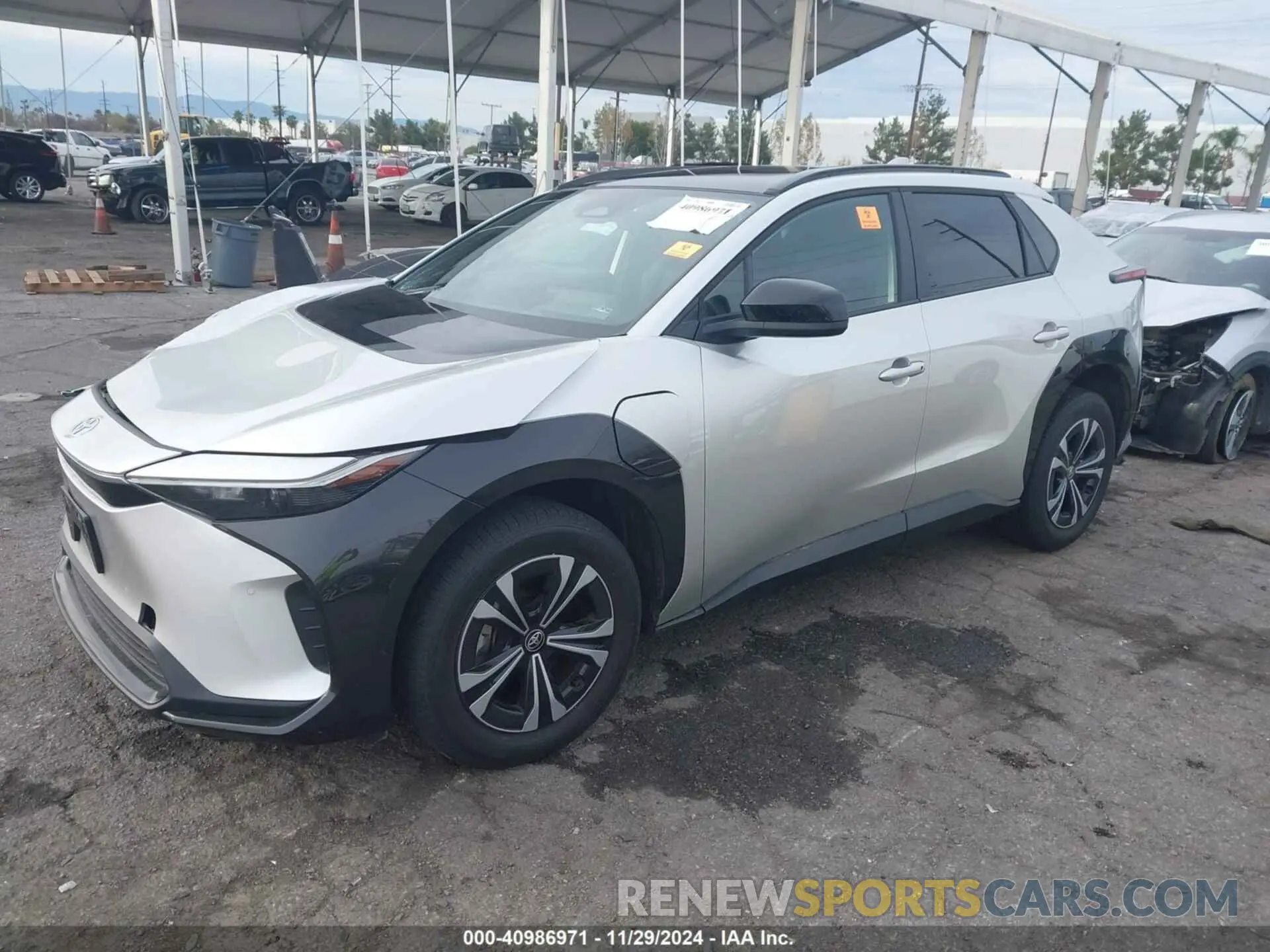 2 fotografías del automóvil dañado JTMAAAAA5PA023390 TOYOTA BZ4X 2023