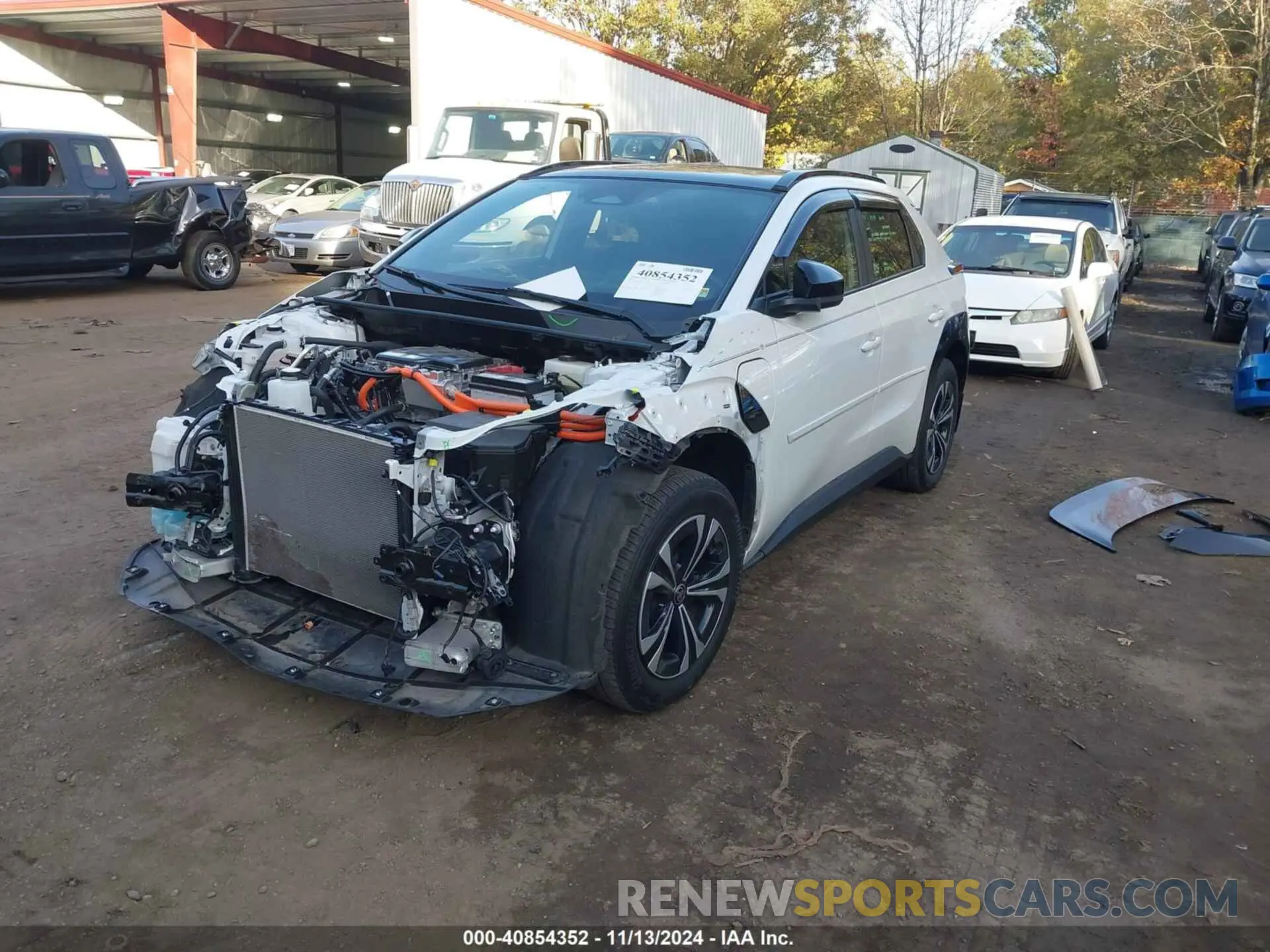 2 fotografías del automóvil dañado JTMABACA6PA015261 TOYOTA BZ4X 2023