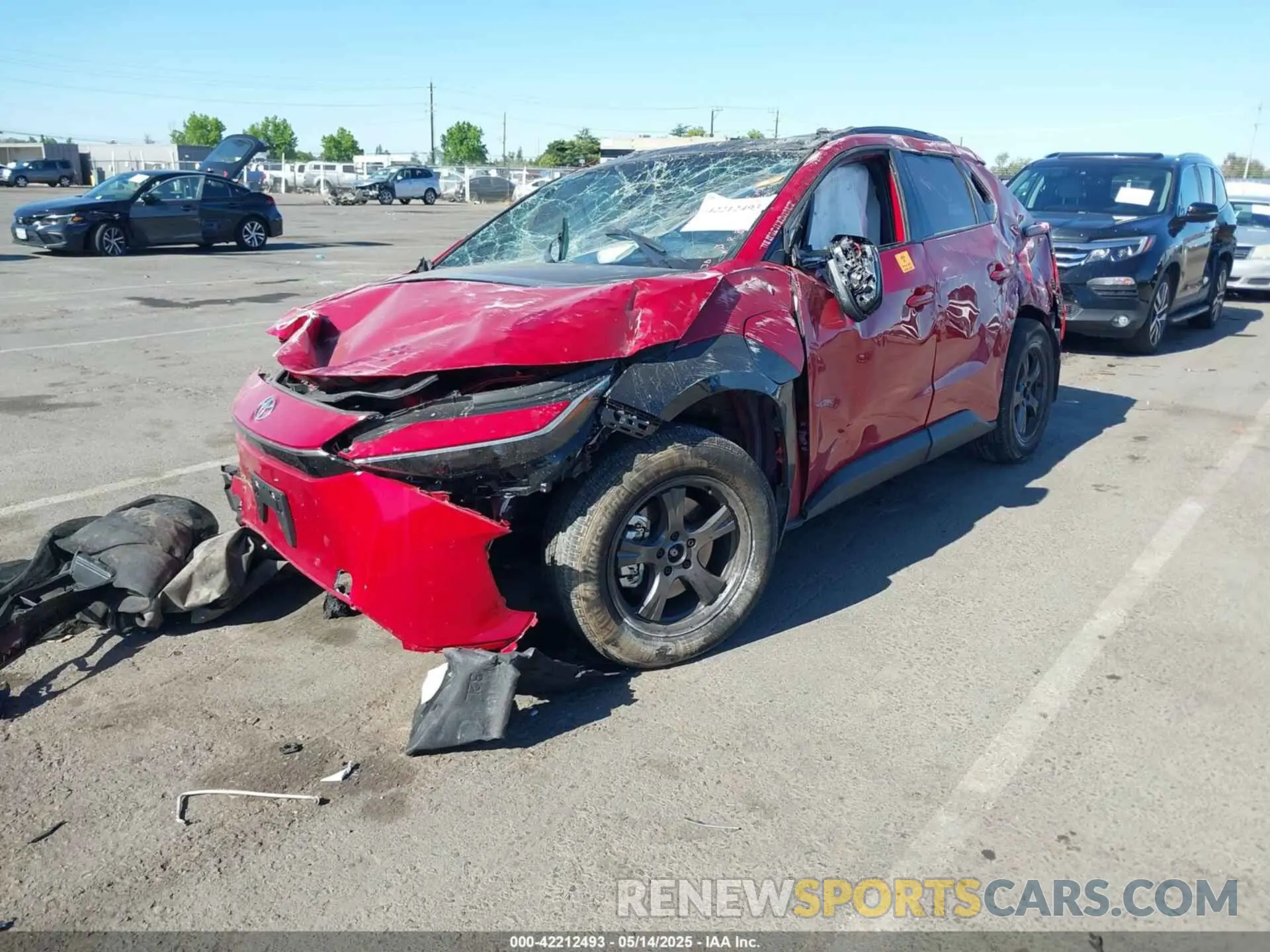 2 fotografías del automóvil dañado JTMABACAXRA078351 TOYOTA BZ4X 2024