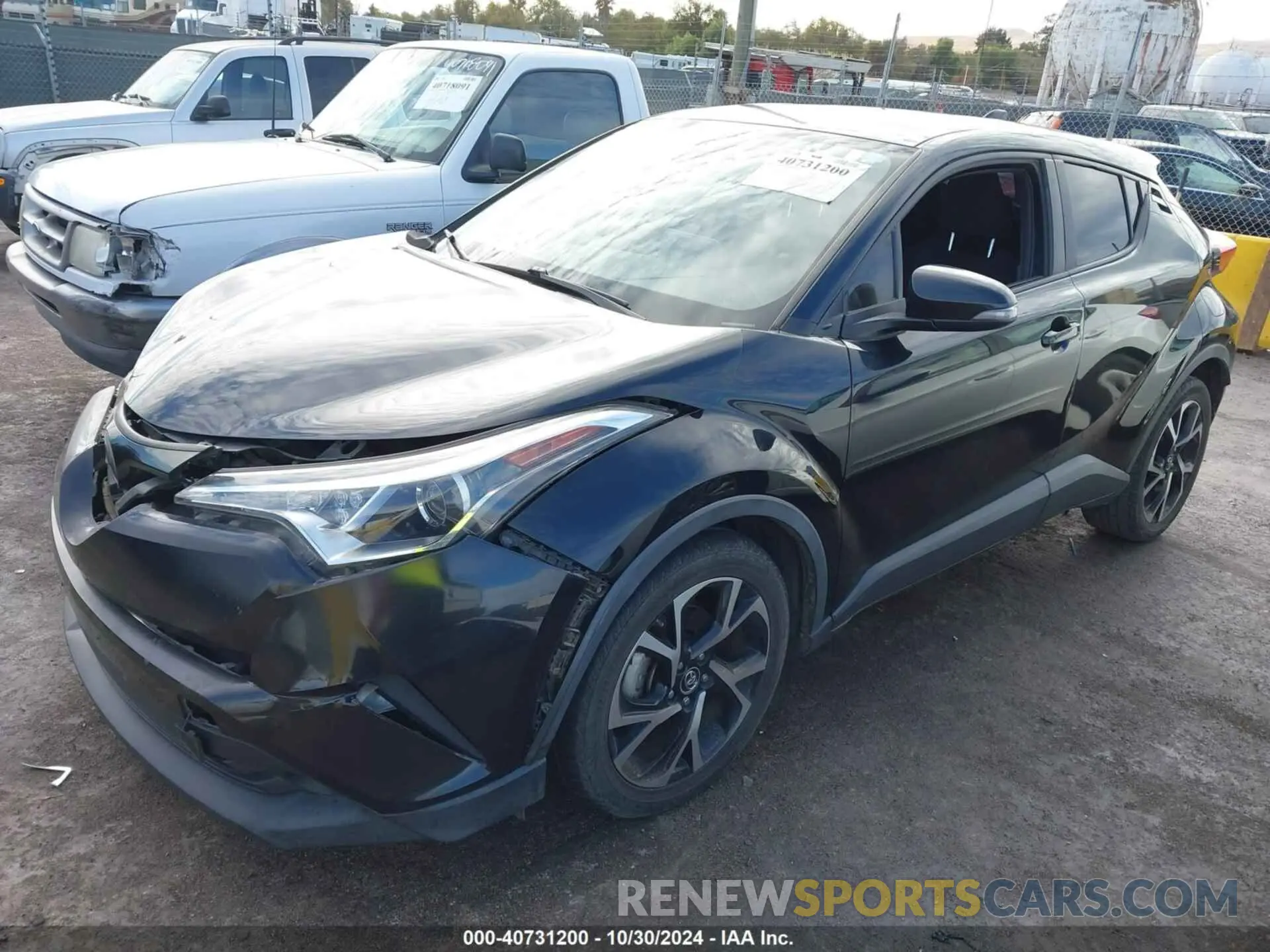 2 fotografías del automóvil dañado JTNKHMBX0K1043202 TOYOTA C-HR 2019