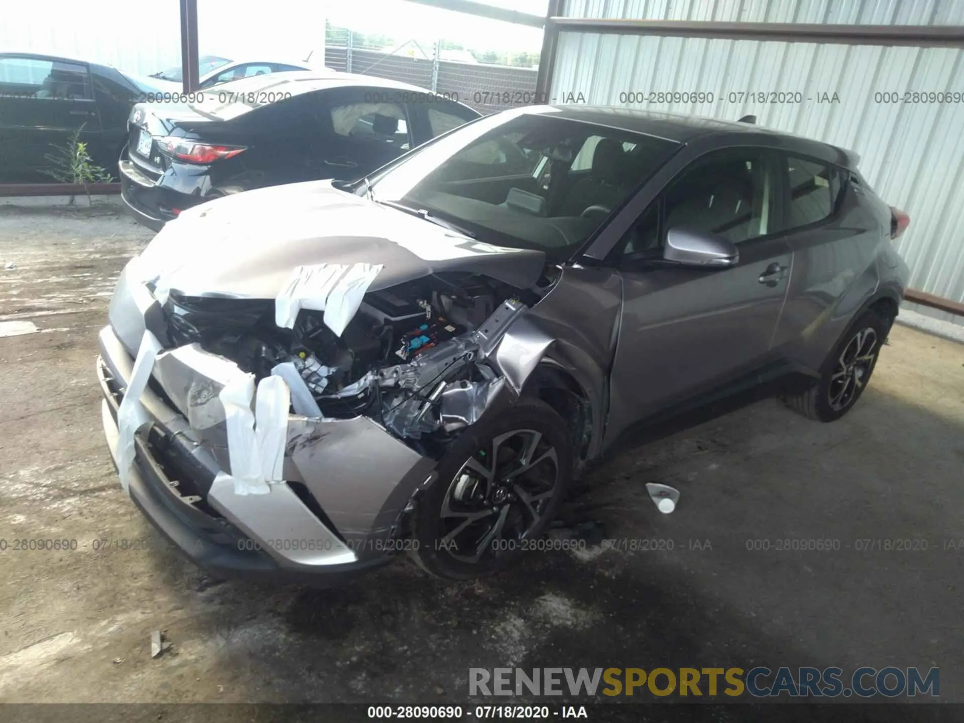2 fotografías del automóvil dañado JTNKHMBX0K1058363 TOYOTA C-HR 2019