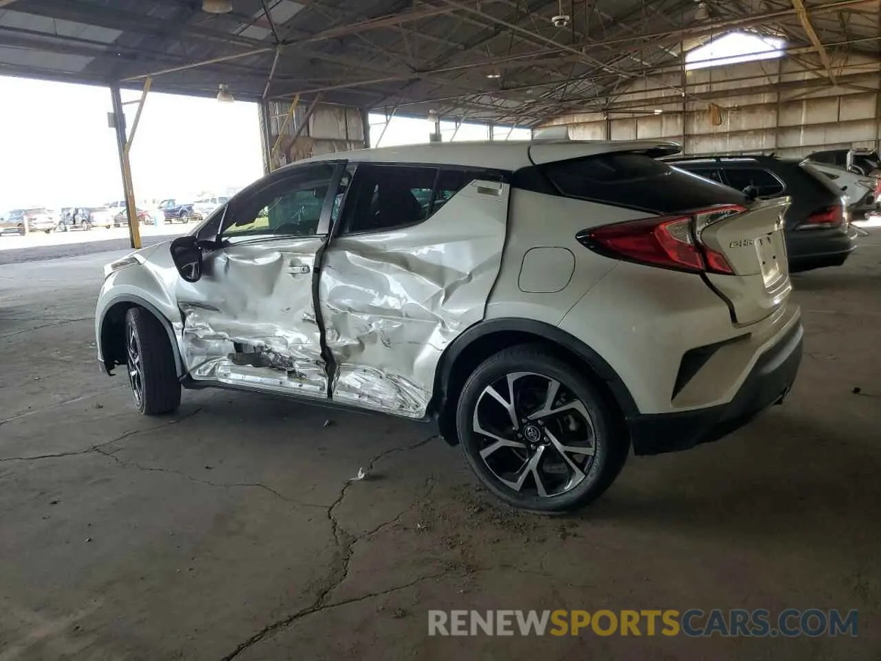 2 fotografías del automóvil dañado JTNKHMBX1K1022441 TOYOTA C-HR 2019