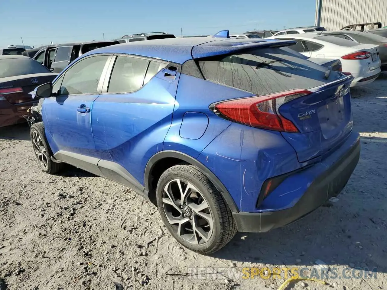 2 fotografías del automóvil dañado JTNKHMBX1K1023623 TOYOTA C-HR 2019