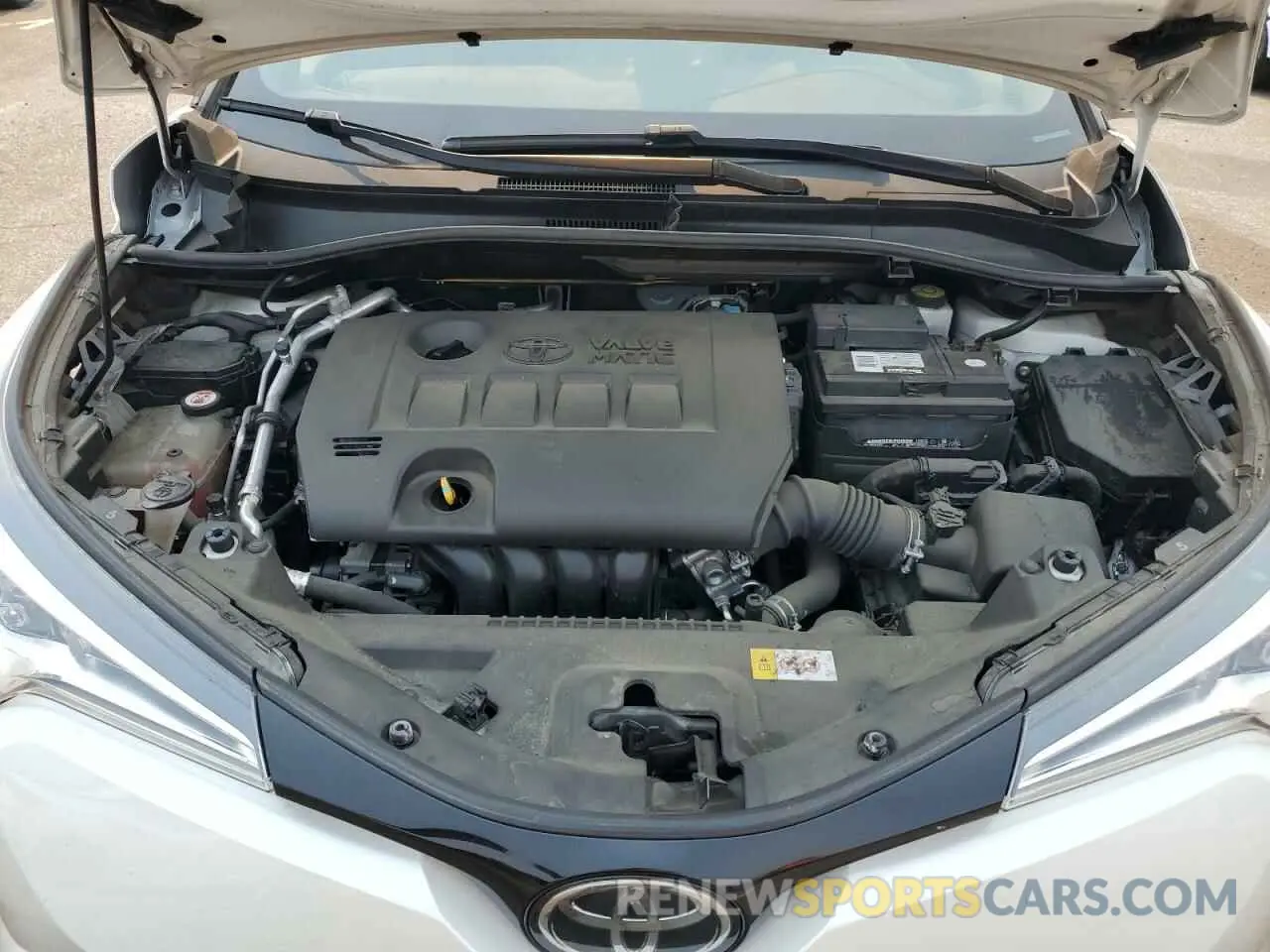 12 fotografías del automóvil dañado JTNKHMBX2K1032797 TOYOTA C-HR 2019