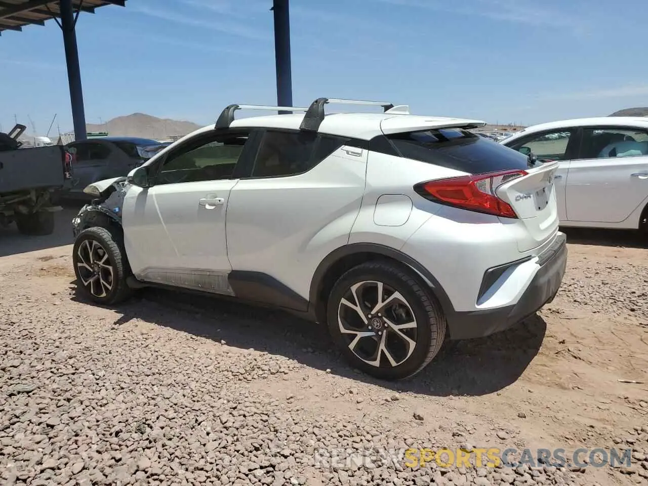 2 fotografías del automóvil dañado JTNKHMBX4K1016293 TOYOTA C-HR 2019