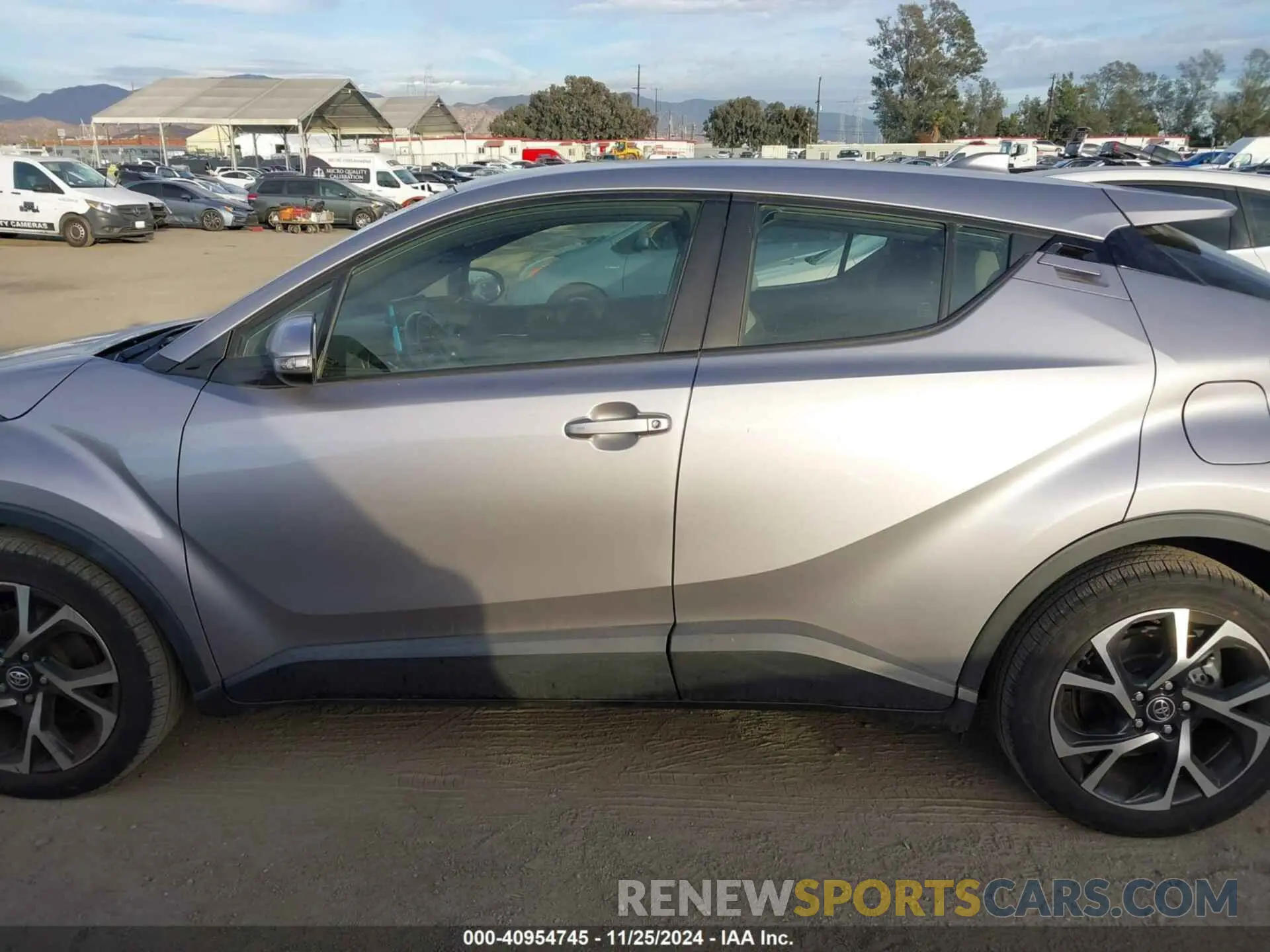 15 fotografías del automóvil dañado JTNKHMBX4K1029156 TOYOTA C-HR 2019
