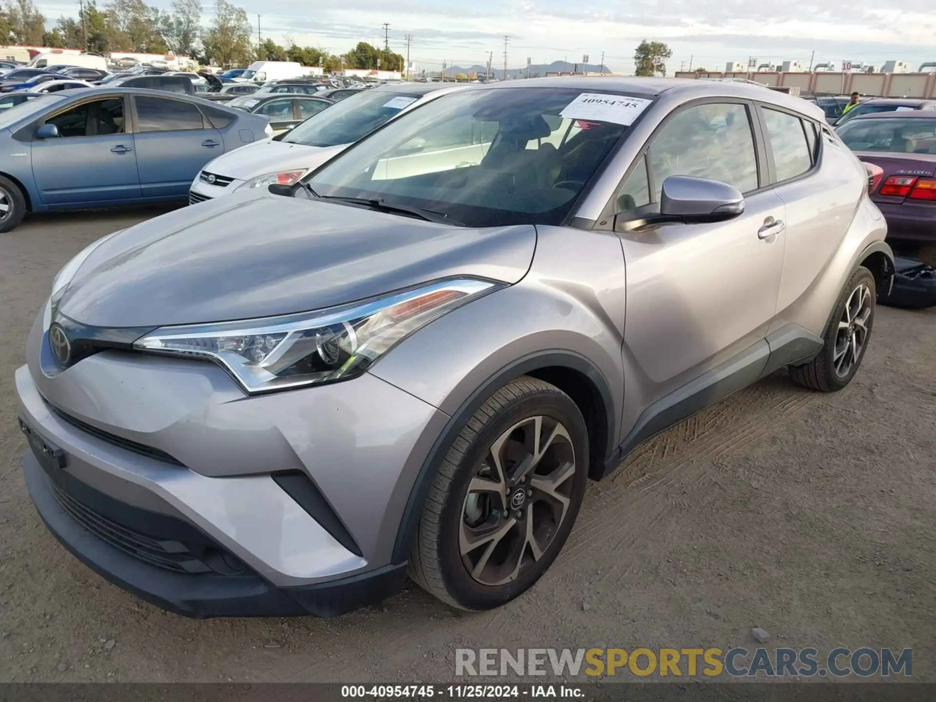2 fotografías del automóvil dañado JTNKHMBX4K1029156 TOYOTA C-HR 2019