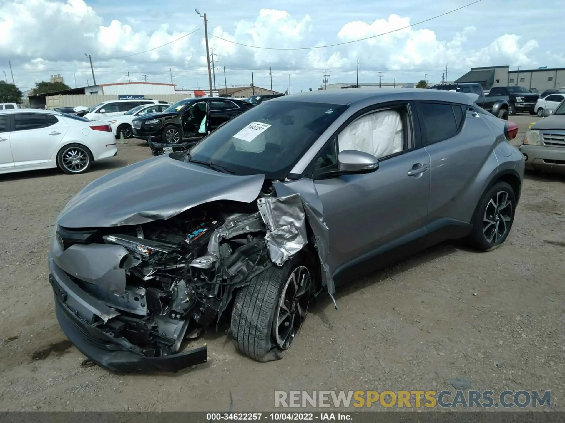 2 fotografías del automóvil dañado JTNKHMBX4K1052579 TOYOTA C-HR 2019