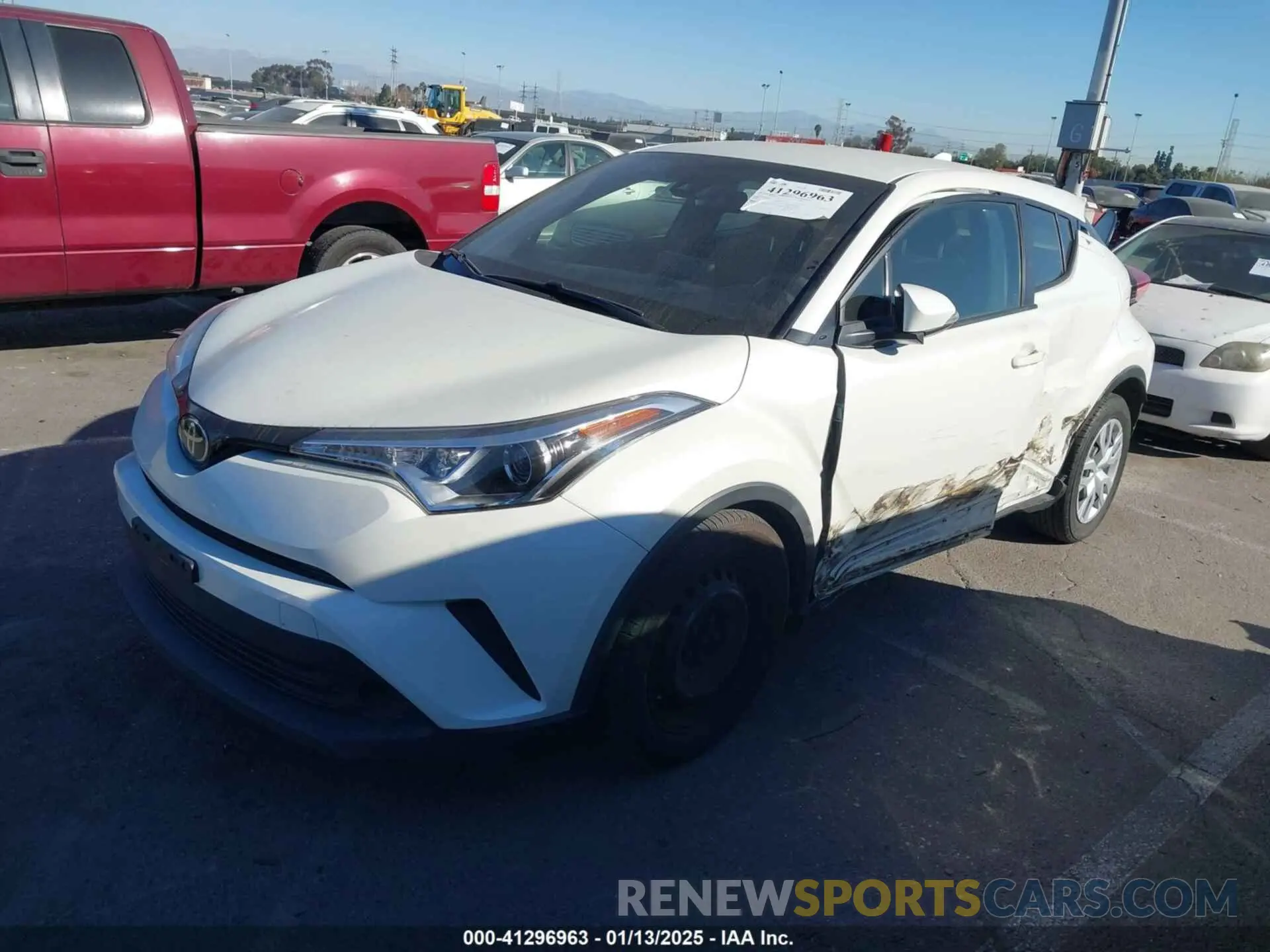 2 fotografías del automóvil dañado JTNKHMBX4K1058916 TOYOTA C-HR 2019