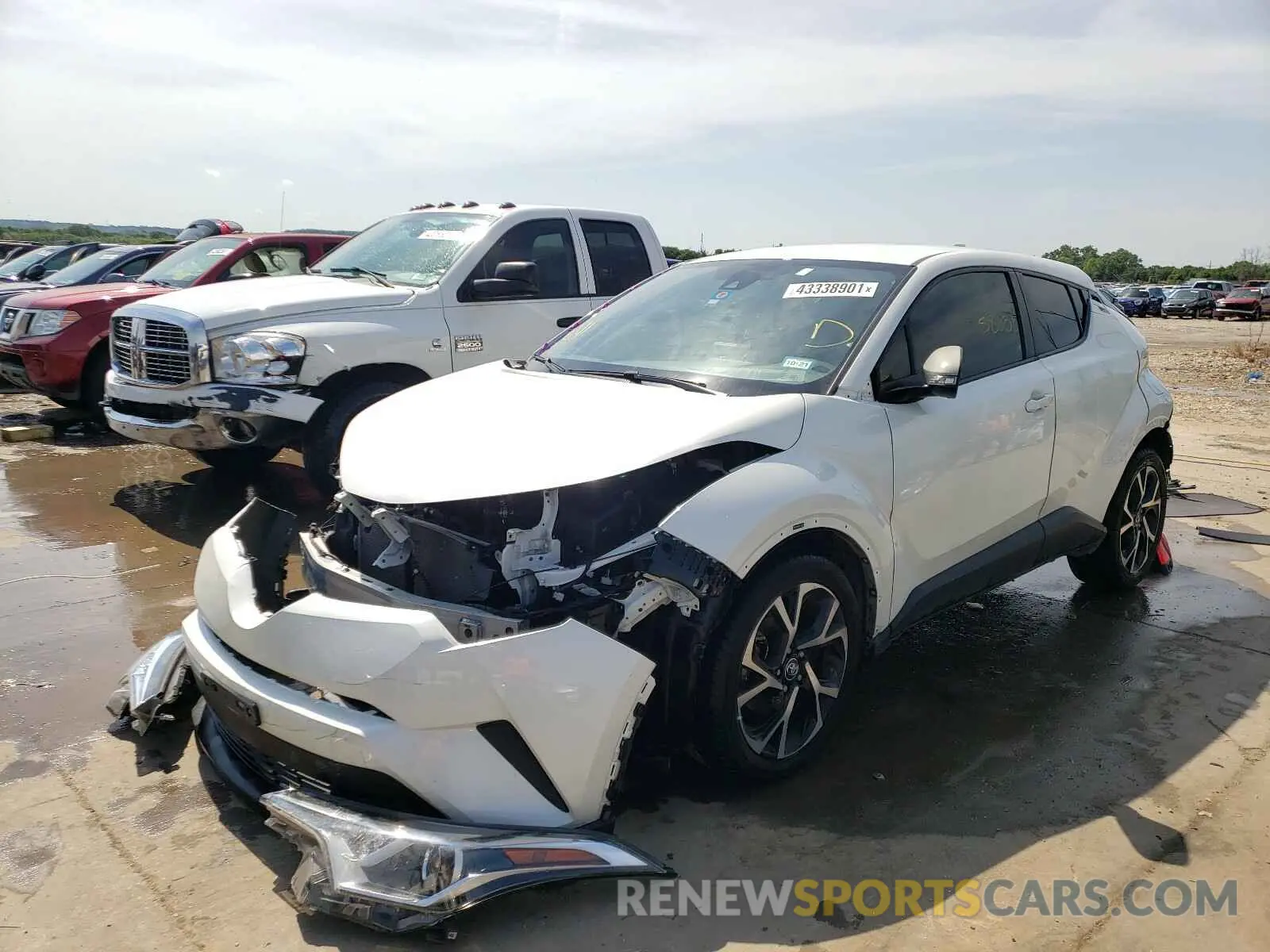 2 fotografías del automóvil dañado JTNKHMBX6K1019518 TOYOTA C-HR 2019
