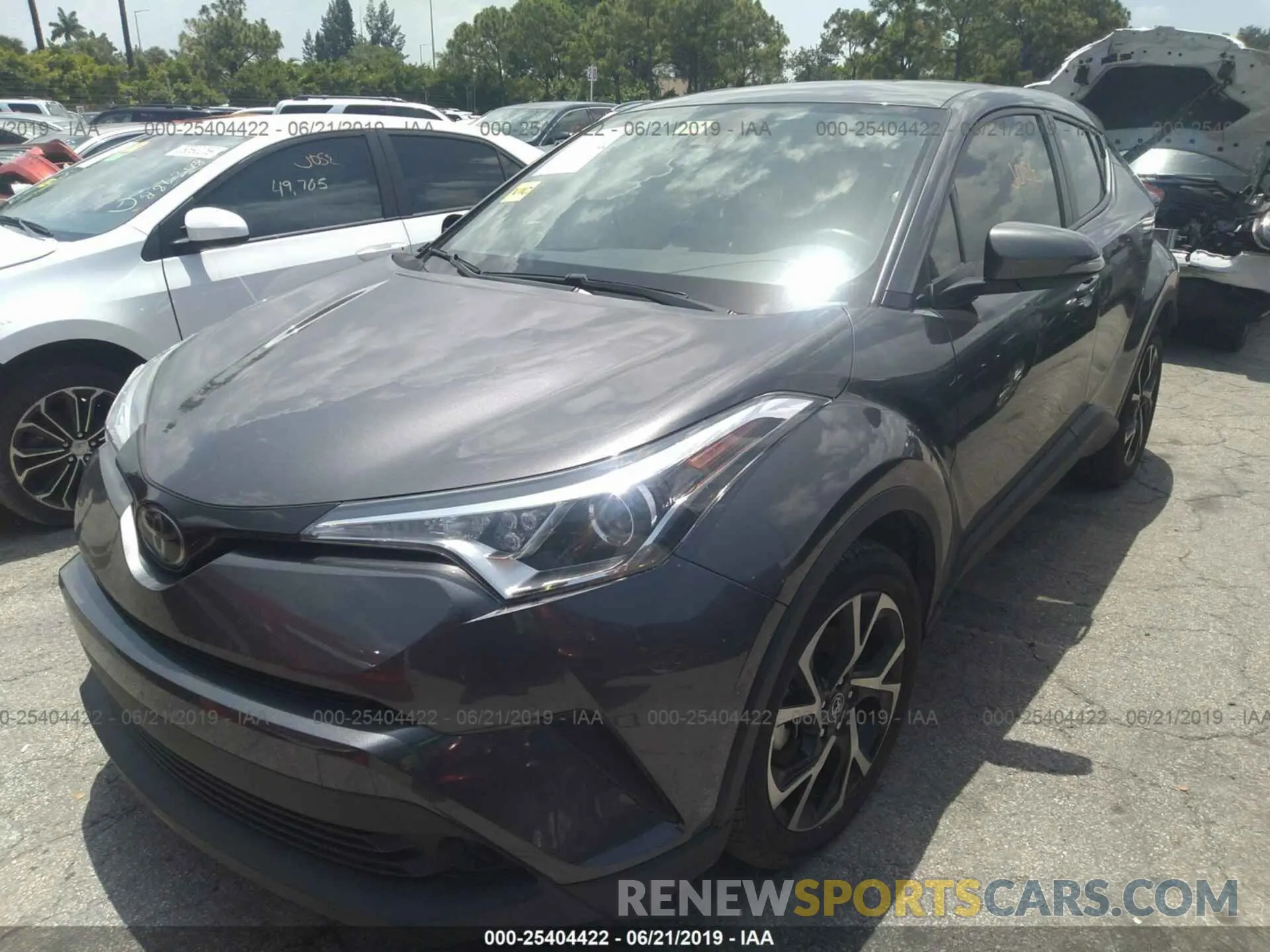 2 fotografías del automóvil dañado JTNKHMBX6K1025156 TOYOTA C-HR 2019