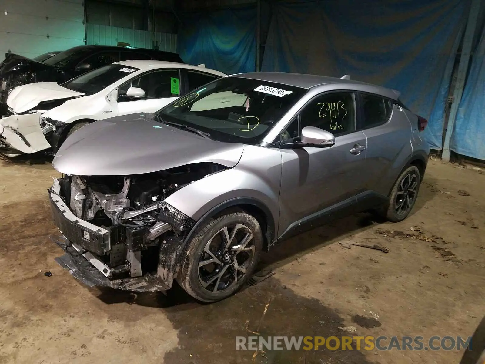 2 fotografías del automóvil dañado JTNKHMBX6K1026775 TOYOTA C-HR 2019