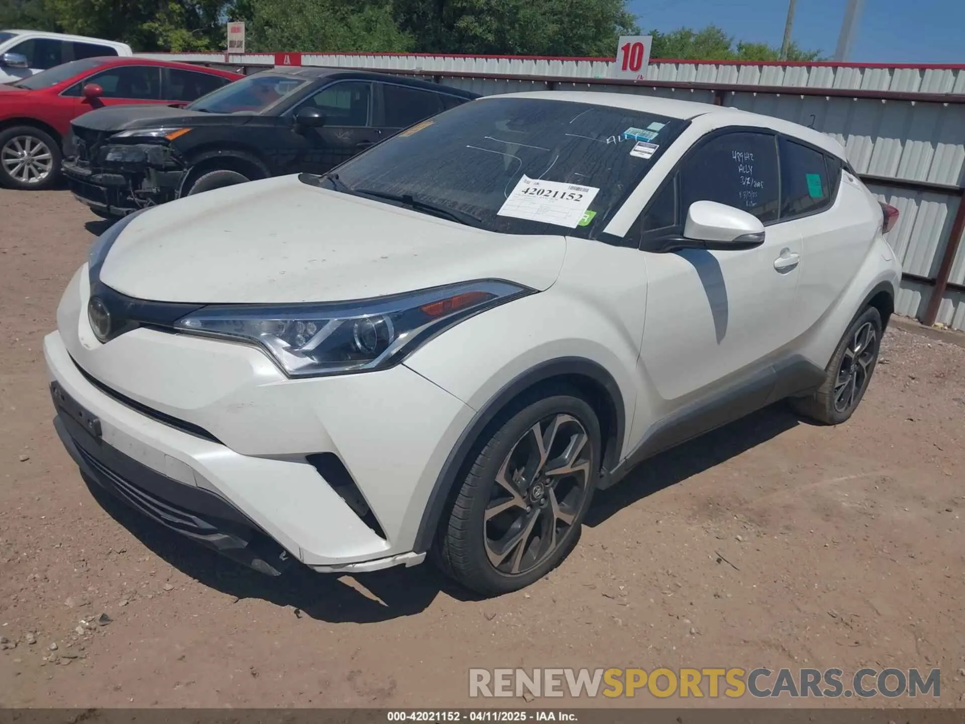 2 fotografías del automóvil dañado JTNKHMBX7K1023674 TOYOTA C-HR 2019