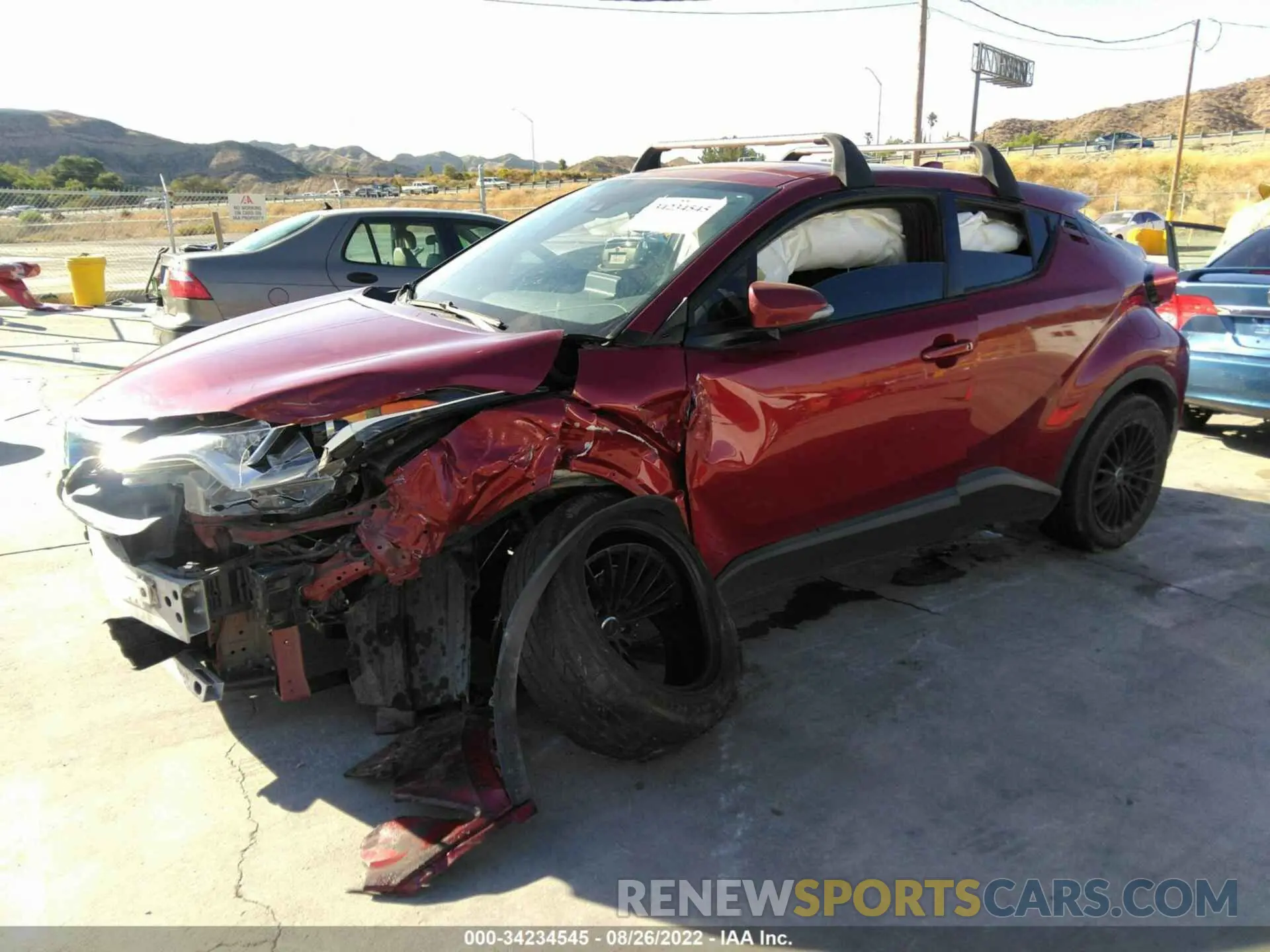 2 fotografías del automóvil dañado JTNKHMBX8K1034490 TOYOTA C-HR 2019