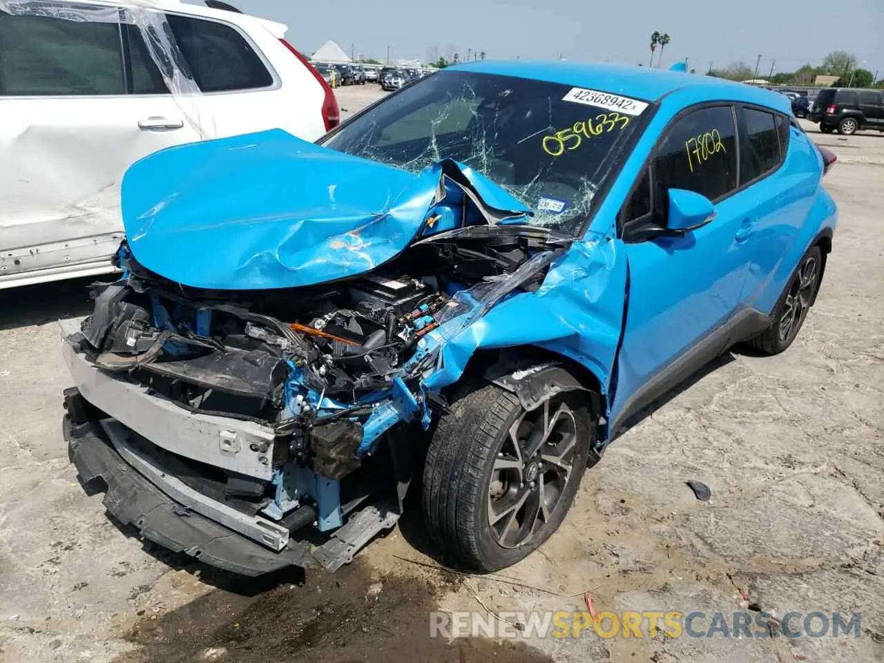 2 fotografías del automóvil dañado JTNKHMBX8K1059633 TOYOTA C-HR 2019