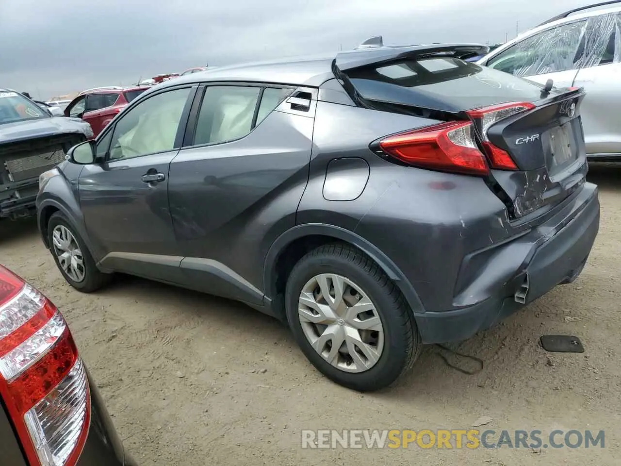 2 fotografías del automóvil dañado JTNKHMBX9K1017391 TOYOTA C-HR 2019