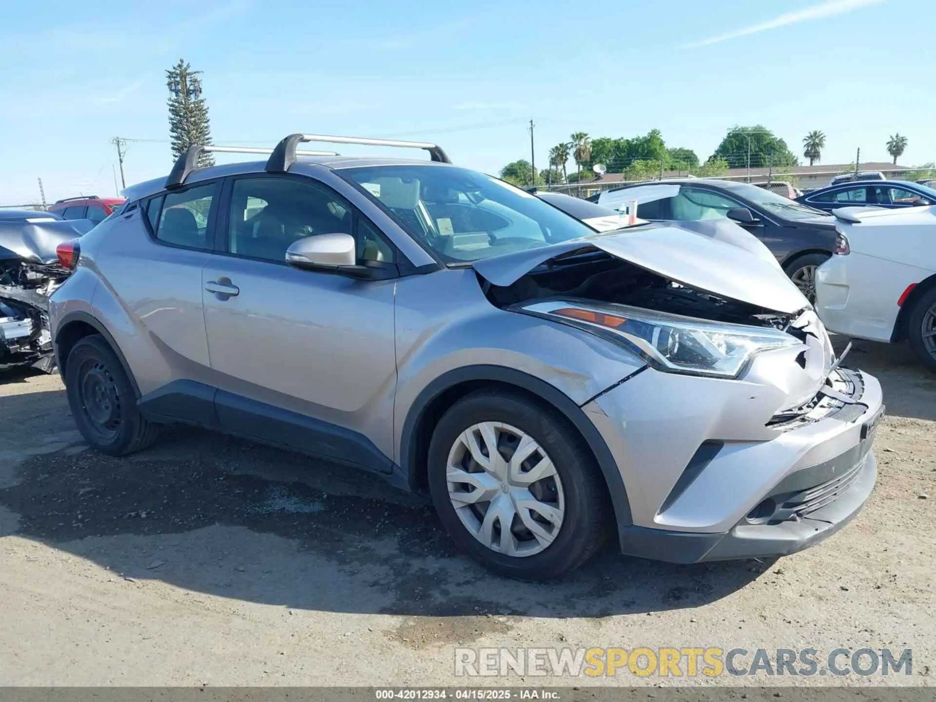 13 fotografías del automóvil dañado JTNKHMBX9K1044591 TOYOTA C-HR 2019