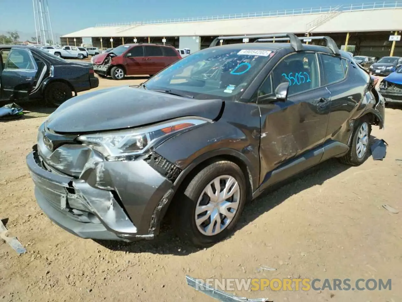 2 fotografías del automóvil dañado JTNKHMBXXK1032014 TOYOTA C-HR 2019