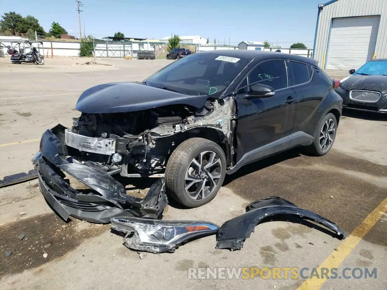2 fotografías del automóvil dañado JTNKHMBXXK1040498 TOYOTA C-HR 2019