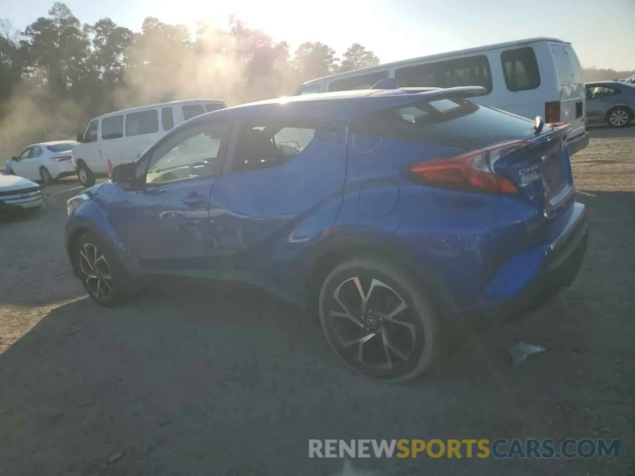 2 fotografías del automóvil dañado JTNKHMBXXK1059472 TOYOTA C-HR 2019