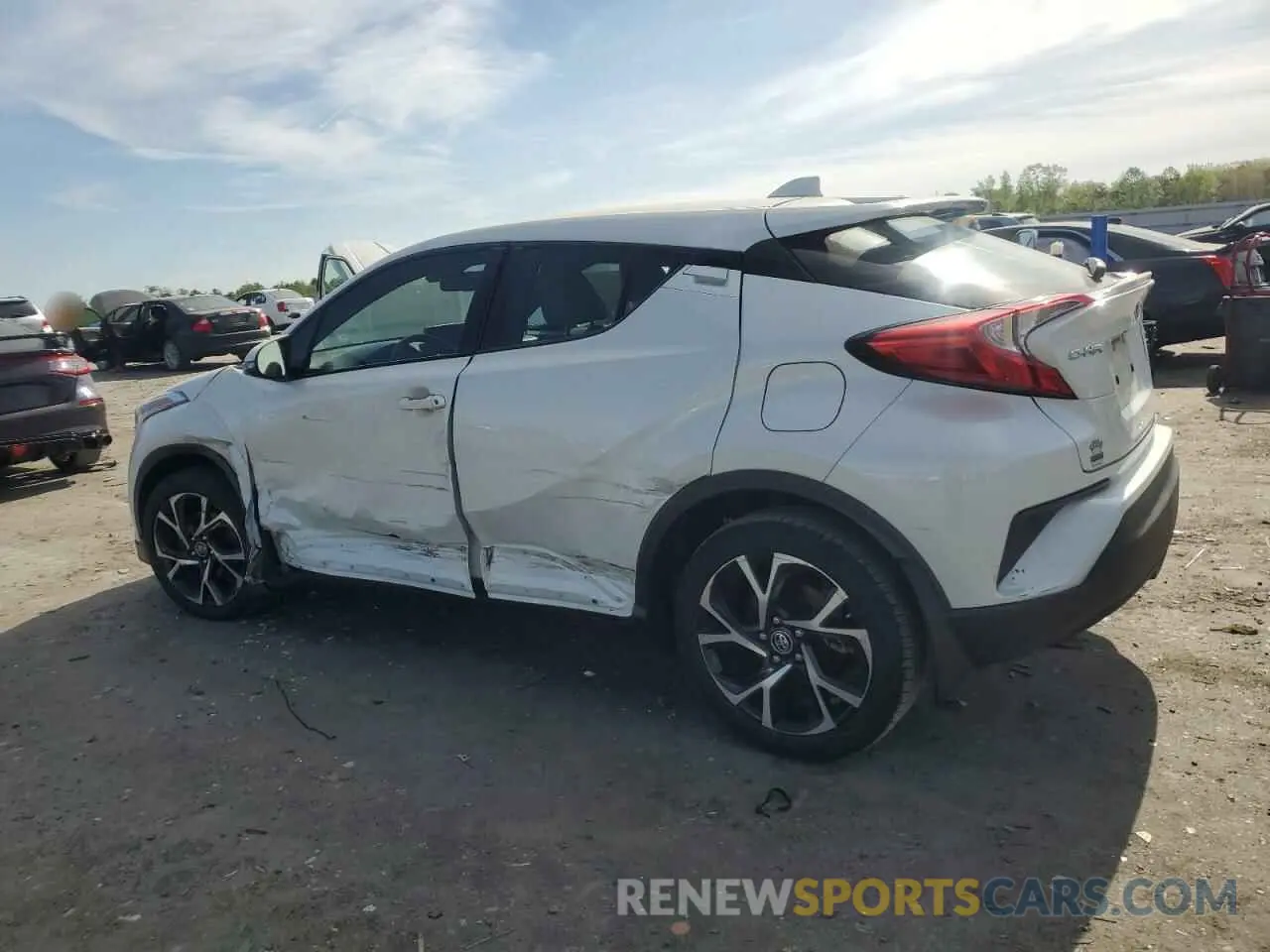 2 fotografías del automóvil dañado NMTKHMBX0KR100407 TOYOTA C-HR 2019