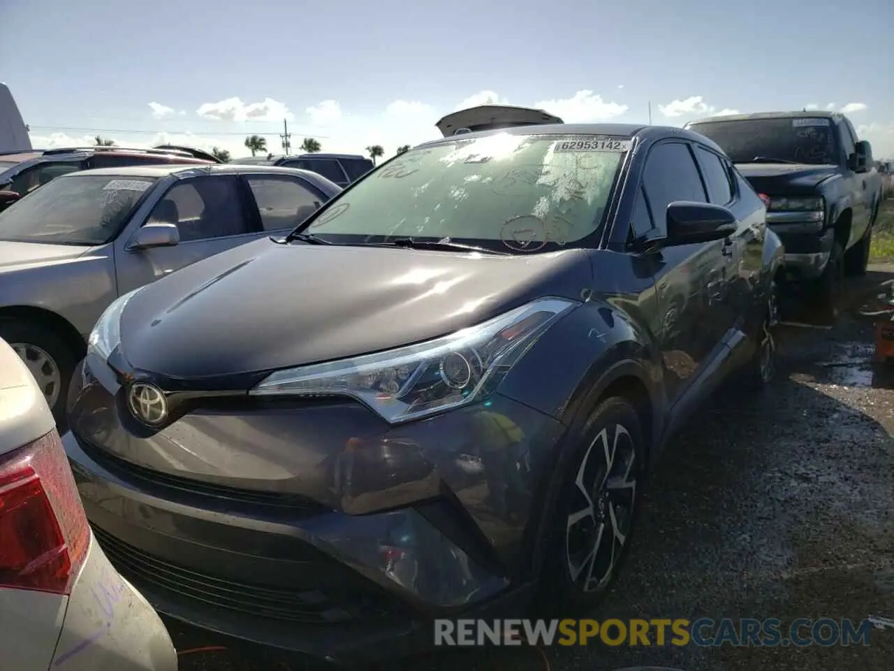 2 fotografías del automóvil dañado NMTKHMBX2KR086235 TOYOTA C-HR 2019